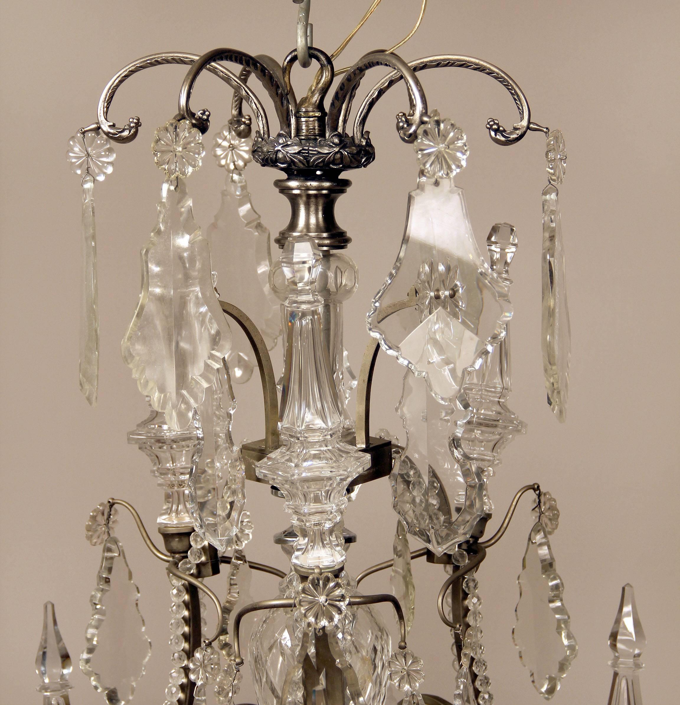Belle Époque Late 19th Century Silvered Bronze and Baccarat Crystal Twelve-Light Chandelier For Sale