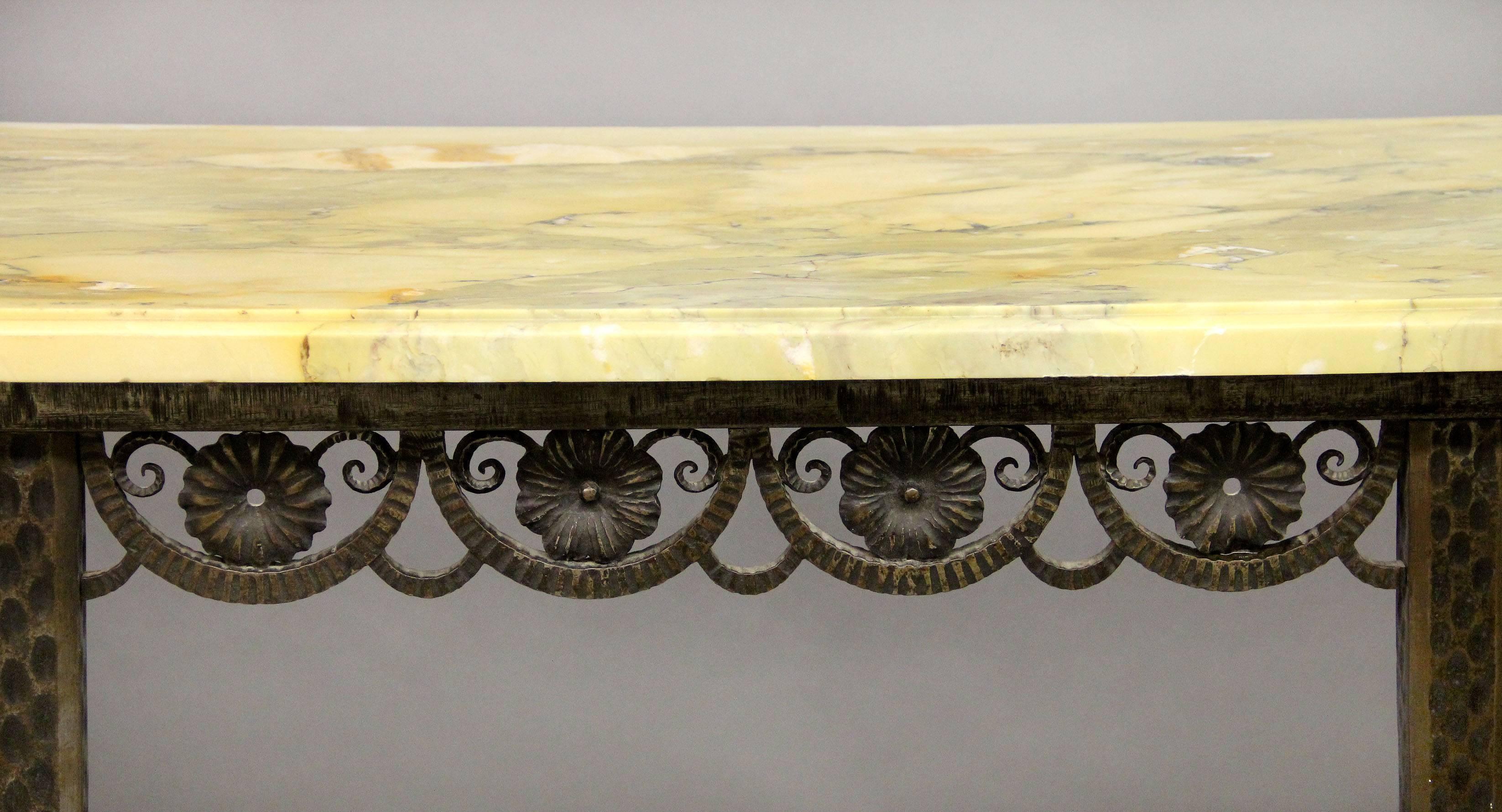 An Exceptional early 20th century cast iron marble-top Art Deco console

The 'D