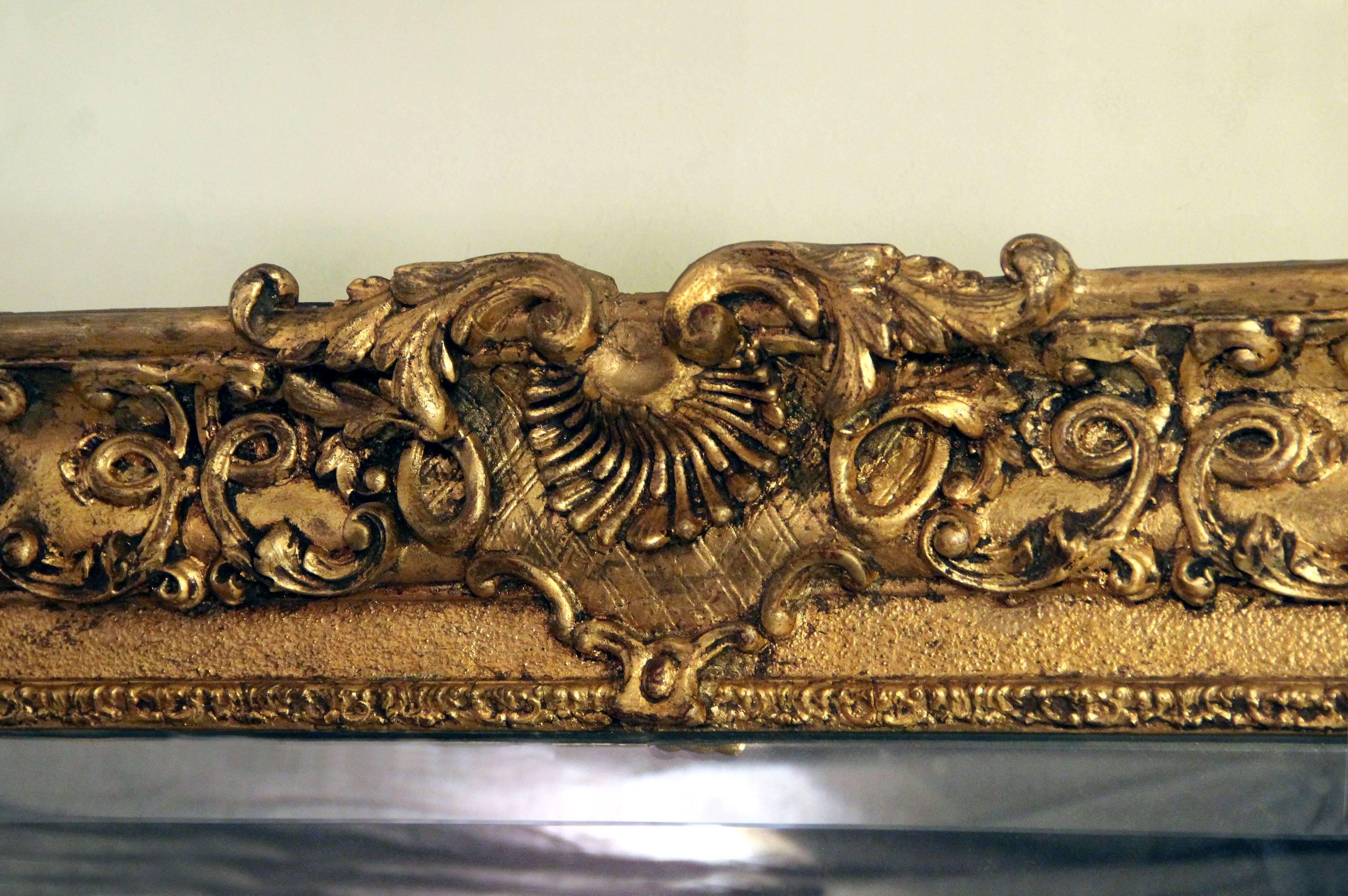 Belle Époque Grand et fantastique miroir biseauté en bois doré sculpté de la fin du XIXe siècle en vente
