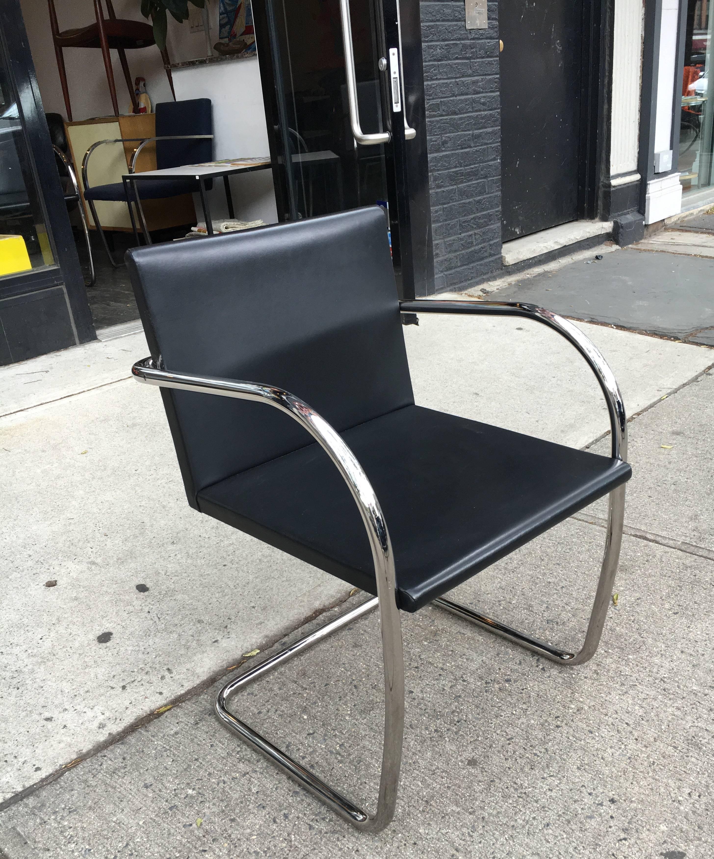 Set of four tubular Brno chairs by Mies van der Rohe for Knoll, black vinyl upholstery, excellent condition.