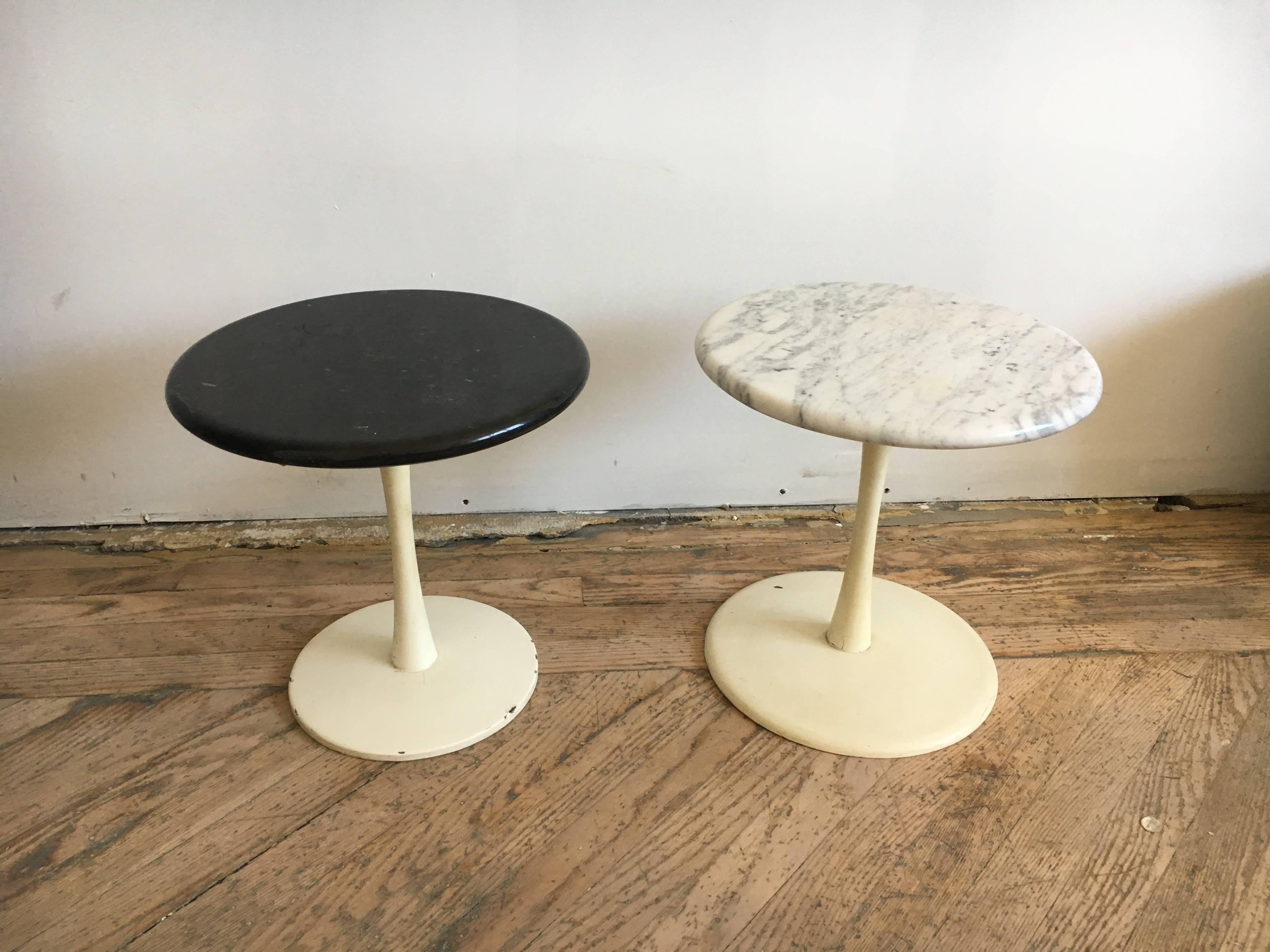Pair of occasional tables designed by Erwin and Estelle Laverne.

Laverne originals.
USA, circa 1960.
Black & white marble, enameled steel.

