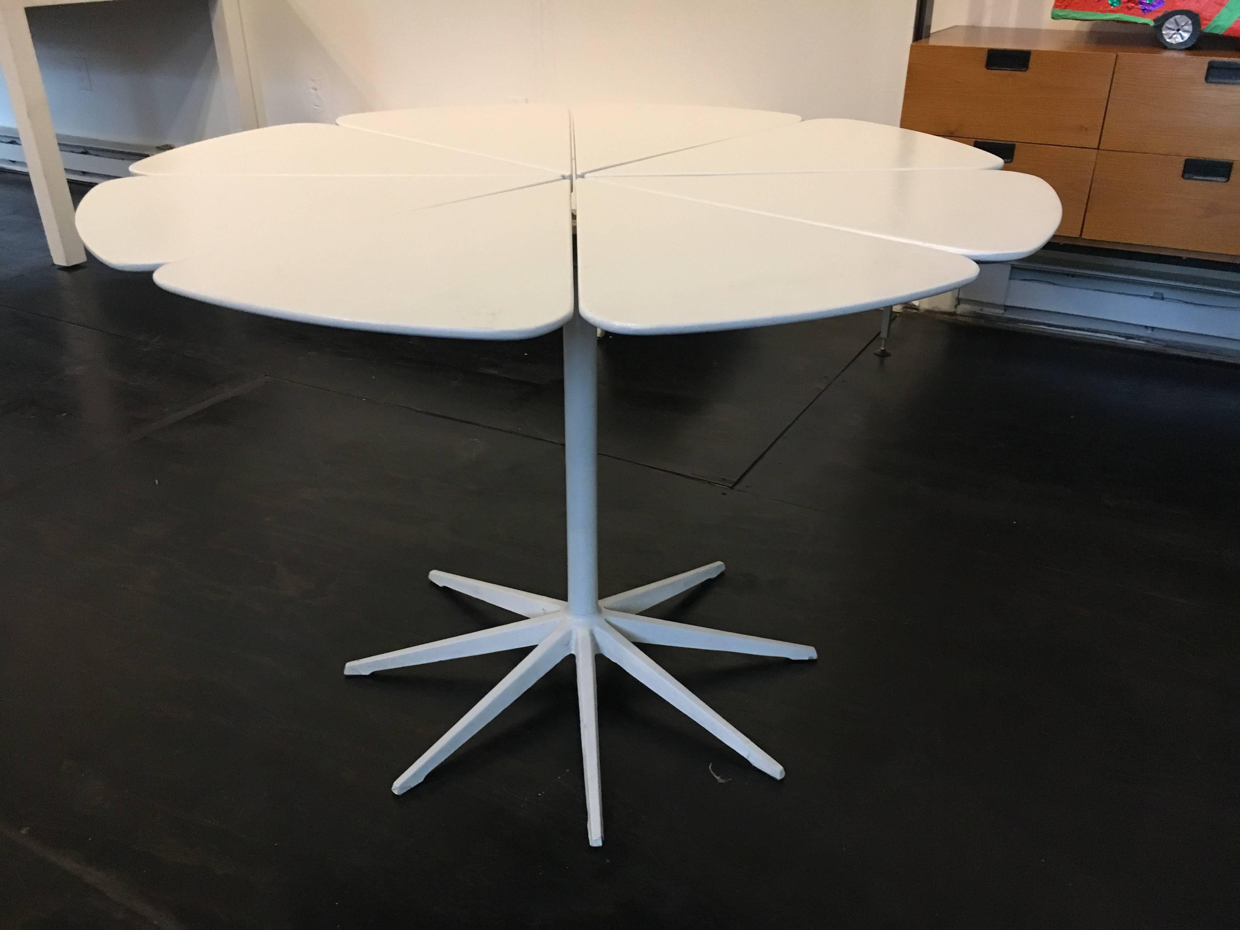 Petal table designed by Richard Schultz for Knoll. White lacquered wood petals with cast iron base.