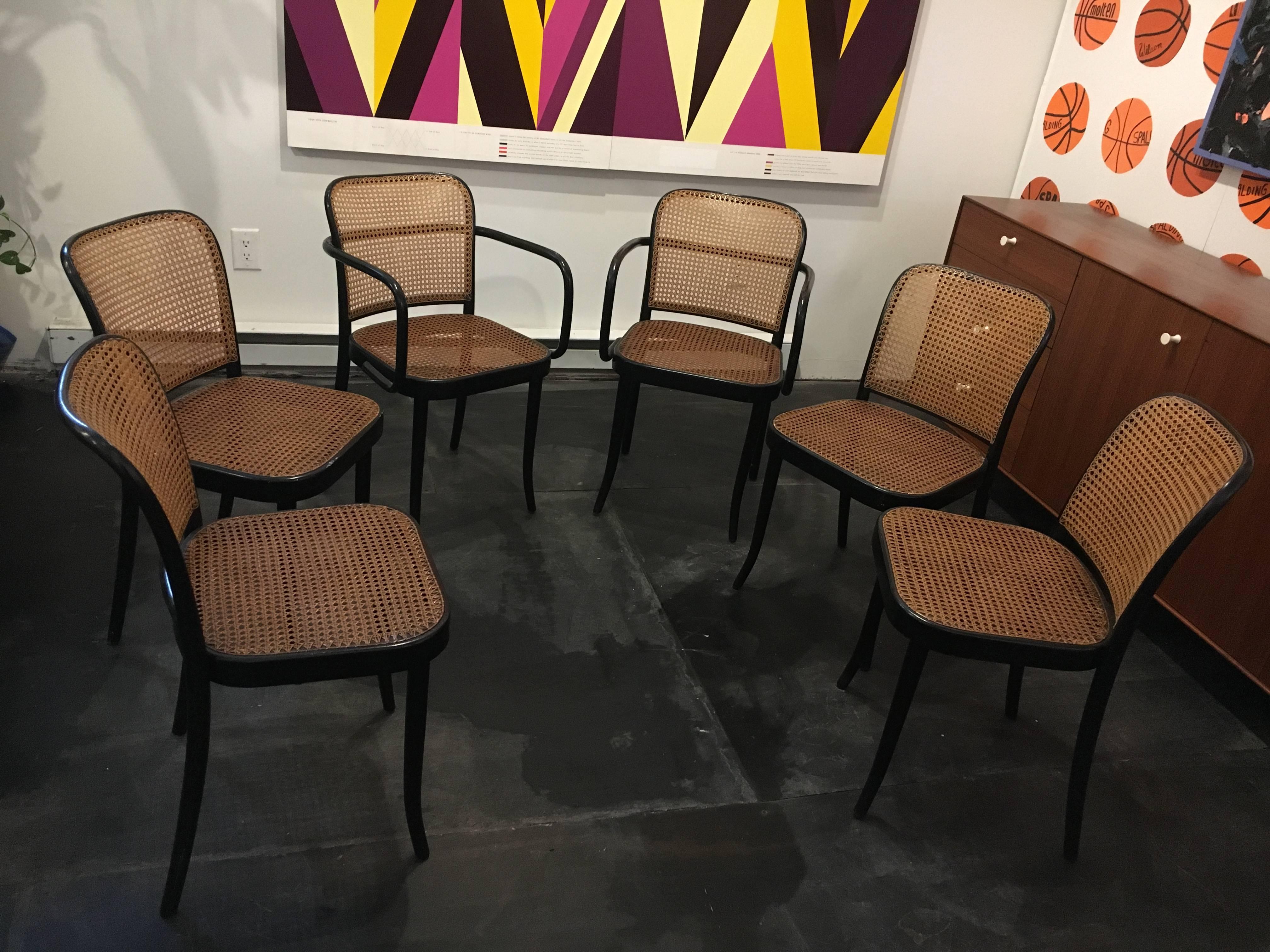 Set of six, two arm and four side chairs, designed by Josef Frank & Josef Hoffmann in the 1920s.
These chairs were manufactured by Stendig, bentwood frames in birch with cane seats and backs.