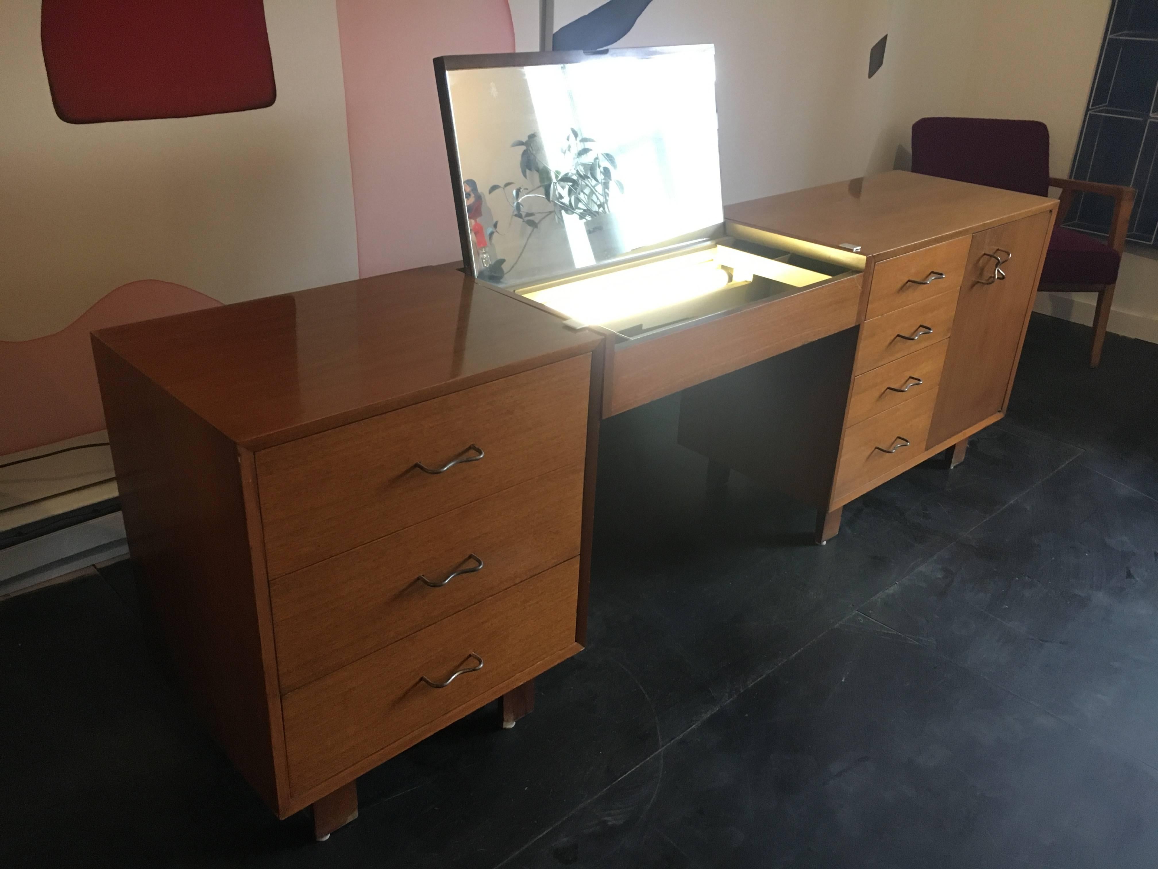 George Nelson walnut credenza, dresser and cabinet with illuminating vanity or desk, designed for Herman Miller.