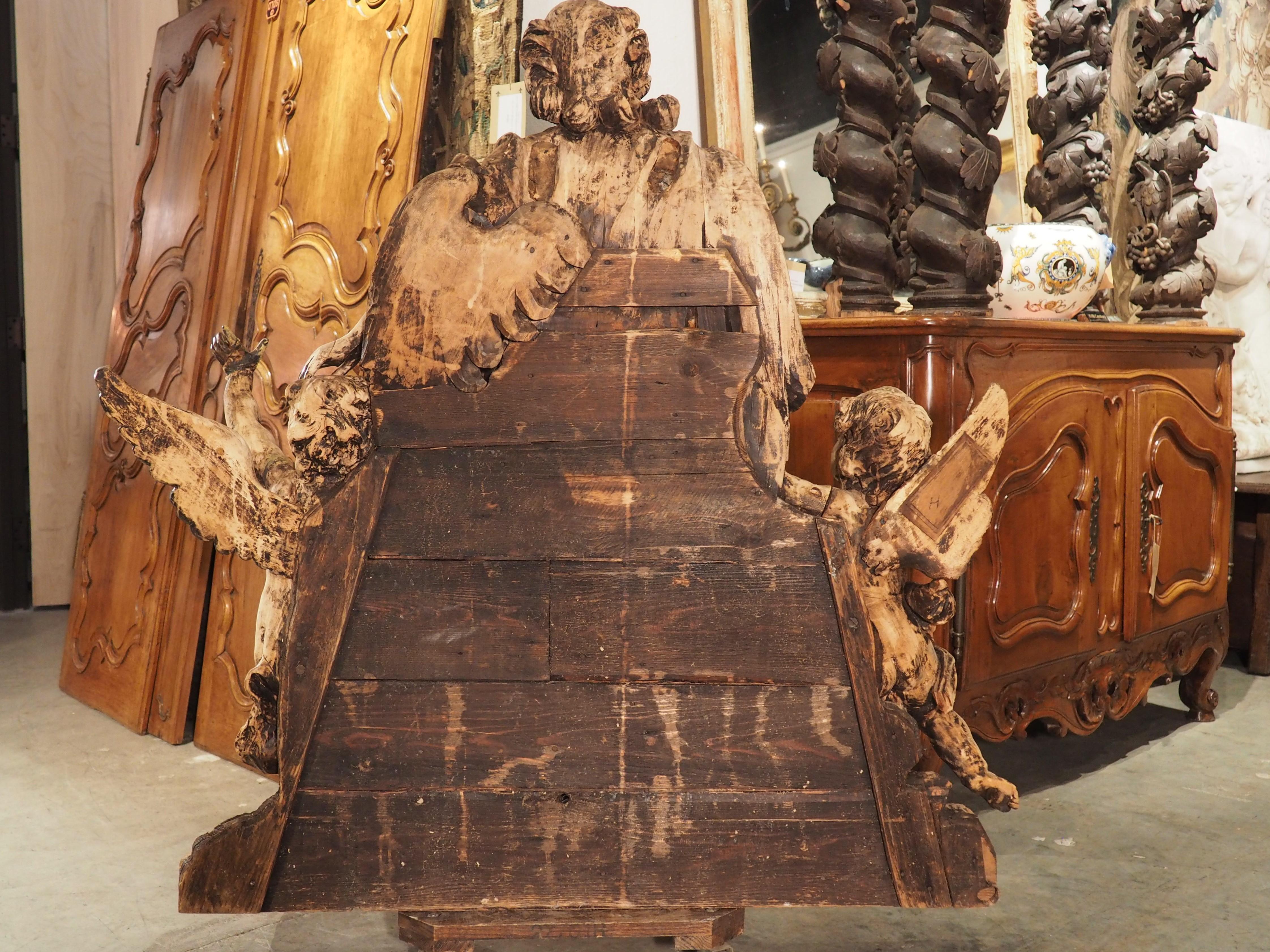 Large 18th Century Wooden Carving of an Angel with Cherubs For Sale 8