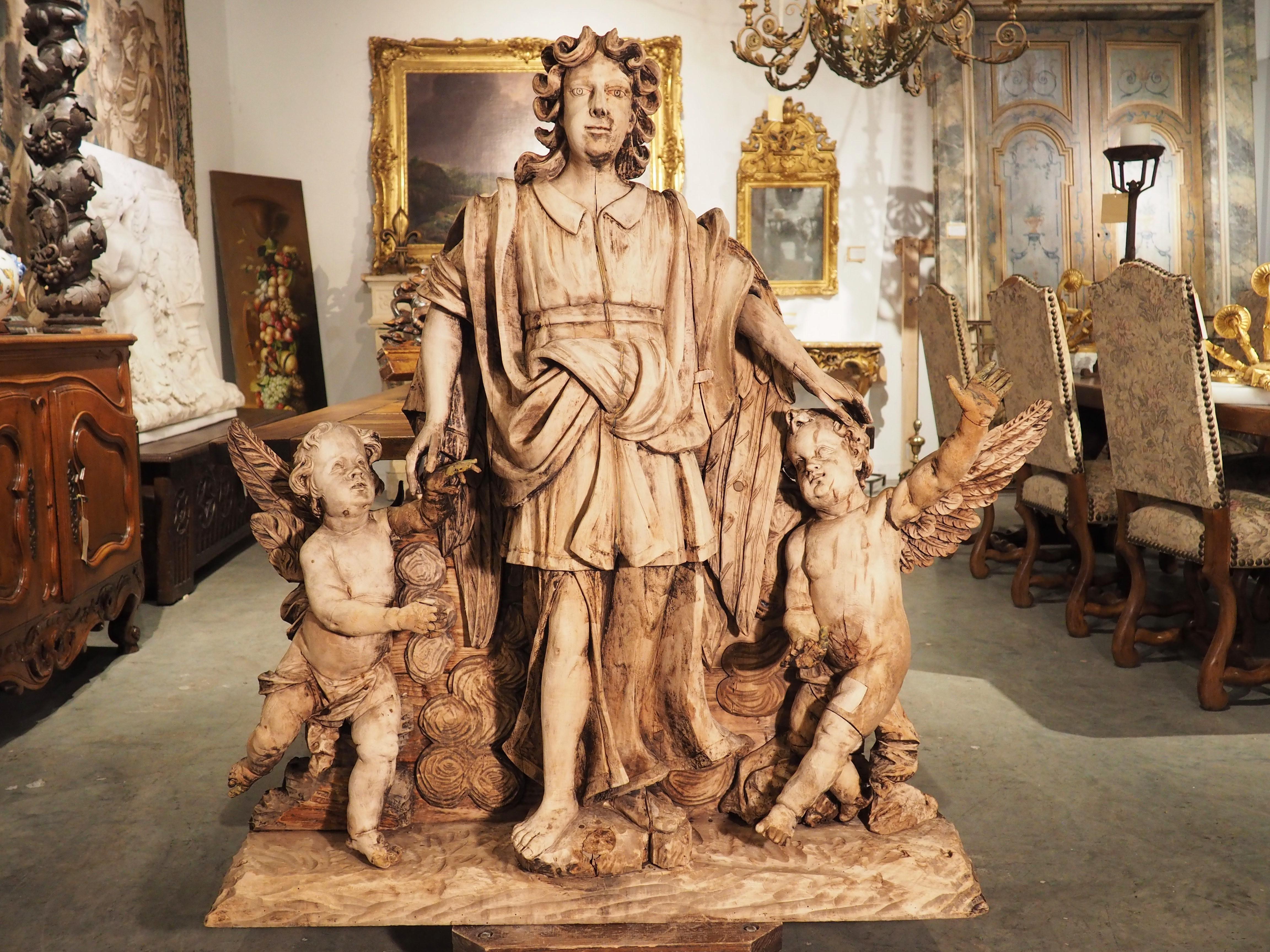 Large 18th Century Wooden Carving of an Angel with Cherubs For Sale 13