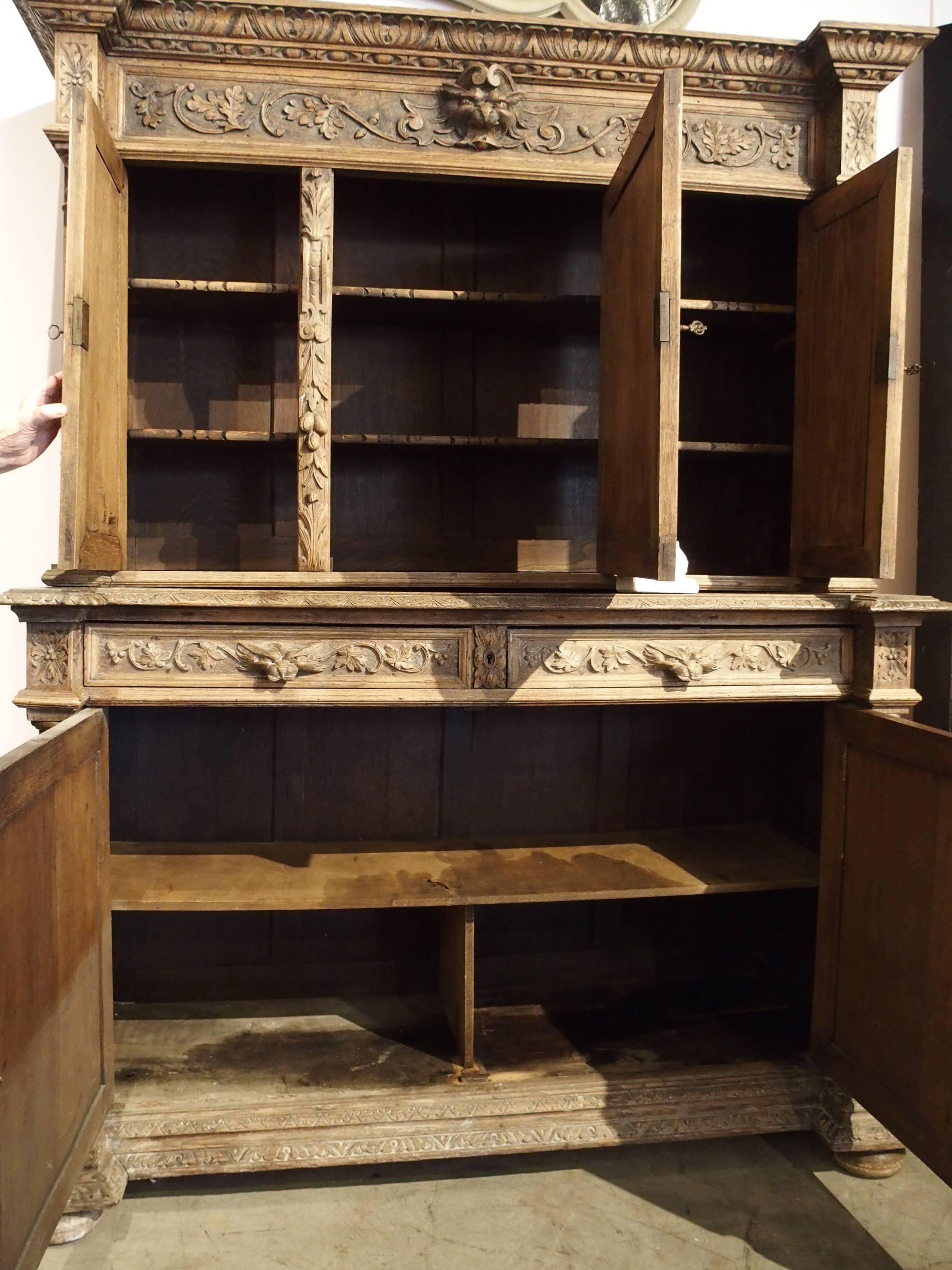 Carved Antique French Hunting Cabinet Made of Stripped Oak, 19th Century