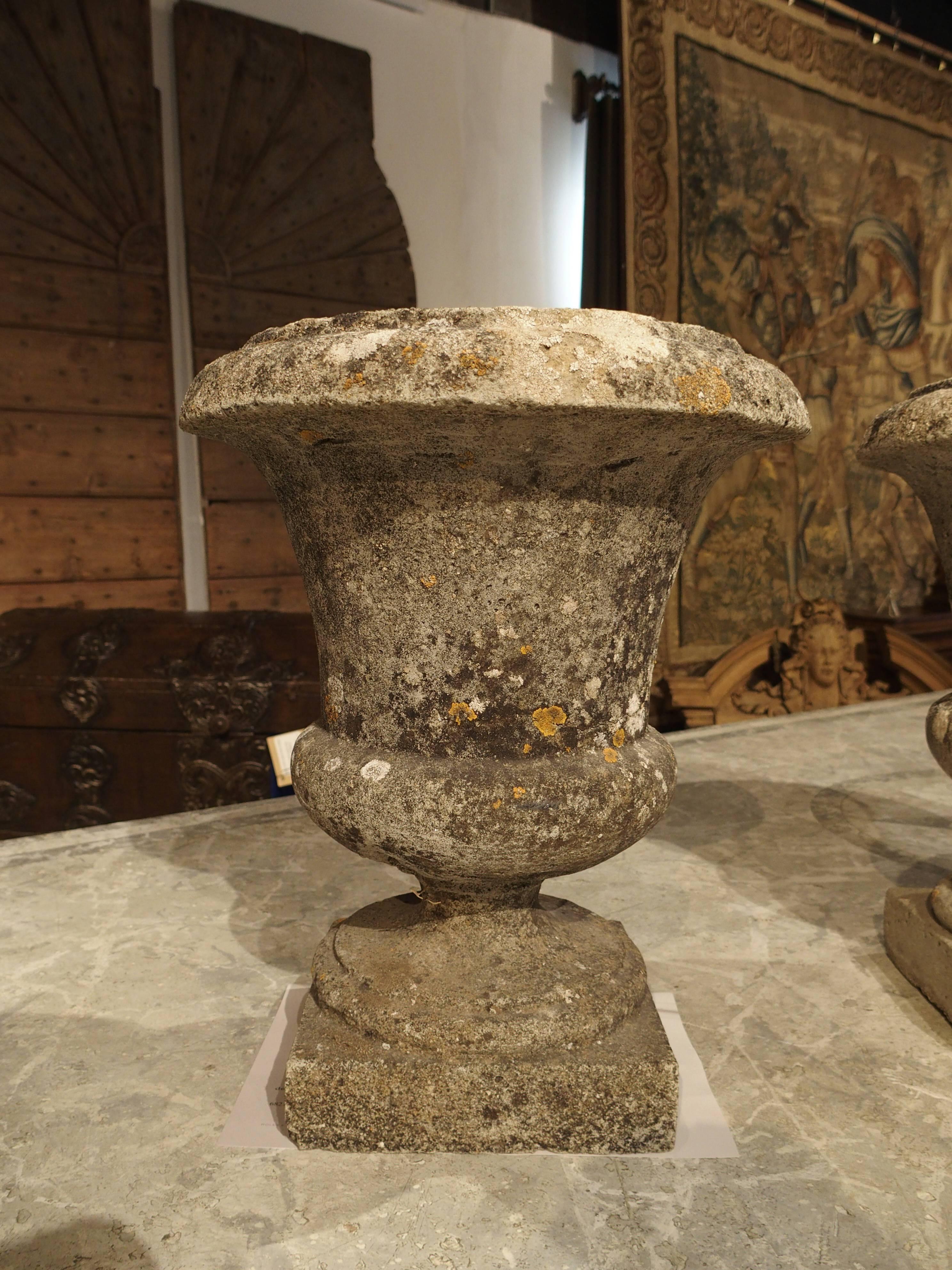 Pair of Small Reconstituted Stone Urns from France In Excellent Condition In Dallas, TX