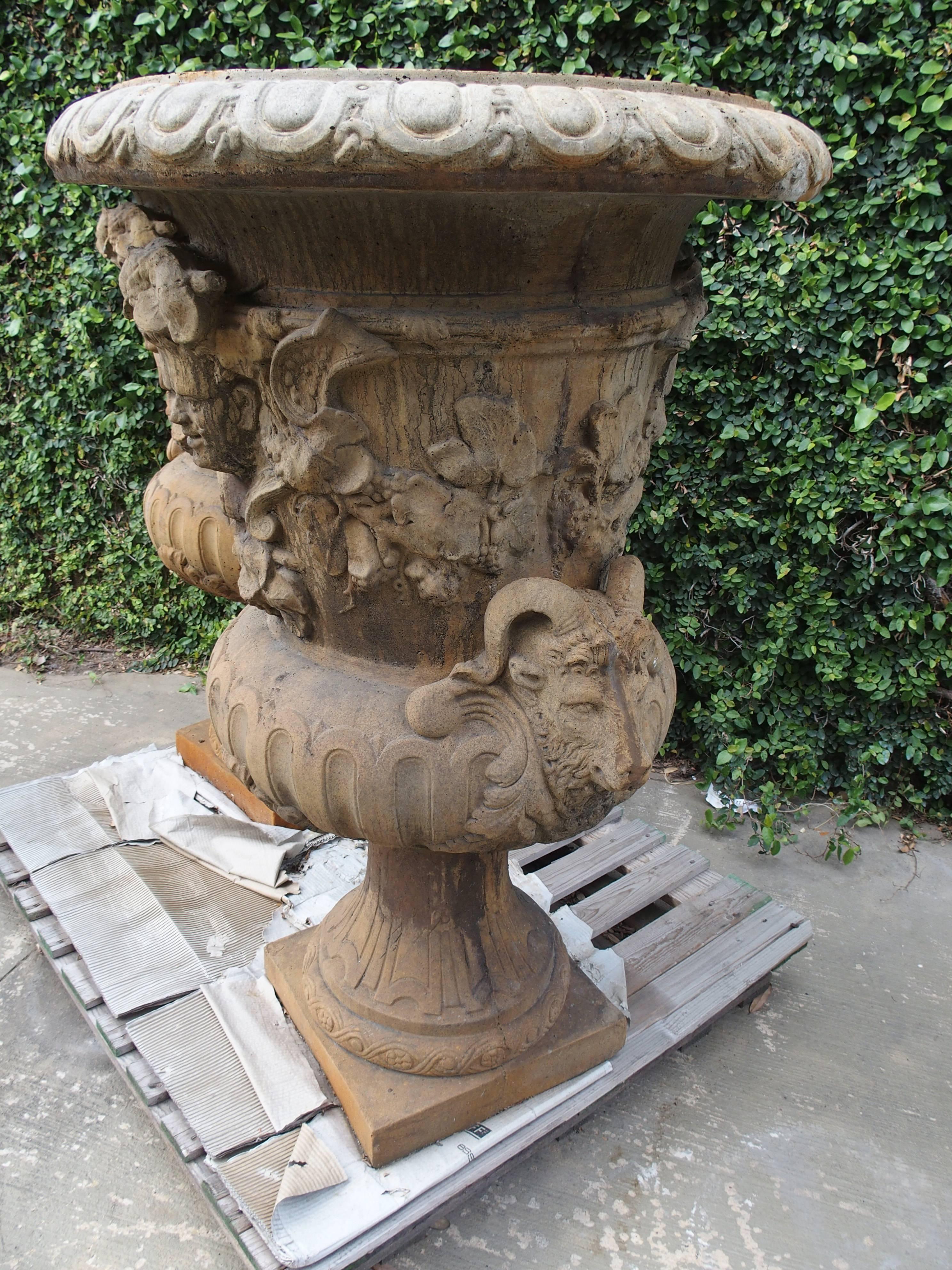 These beautiful and very large urns are cast using 3 types of crushed stone as well as cement. Special terra coloring.

H=50 1/4, Max Width=33 1/2