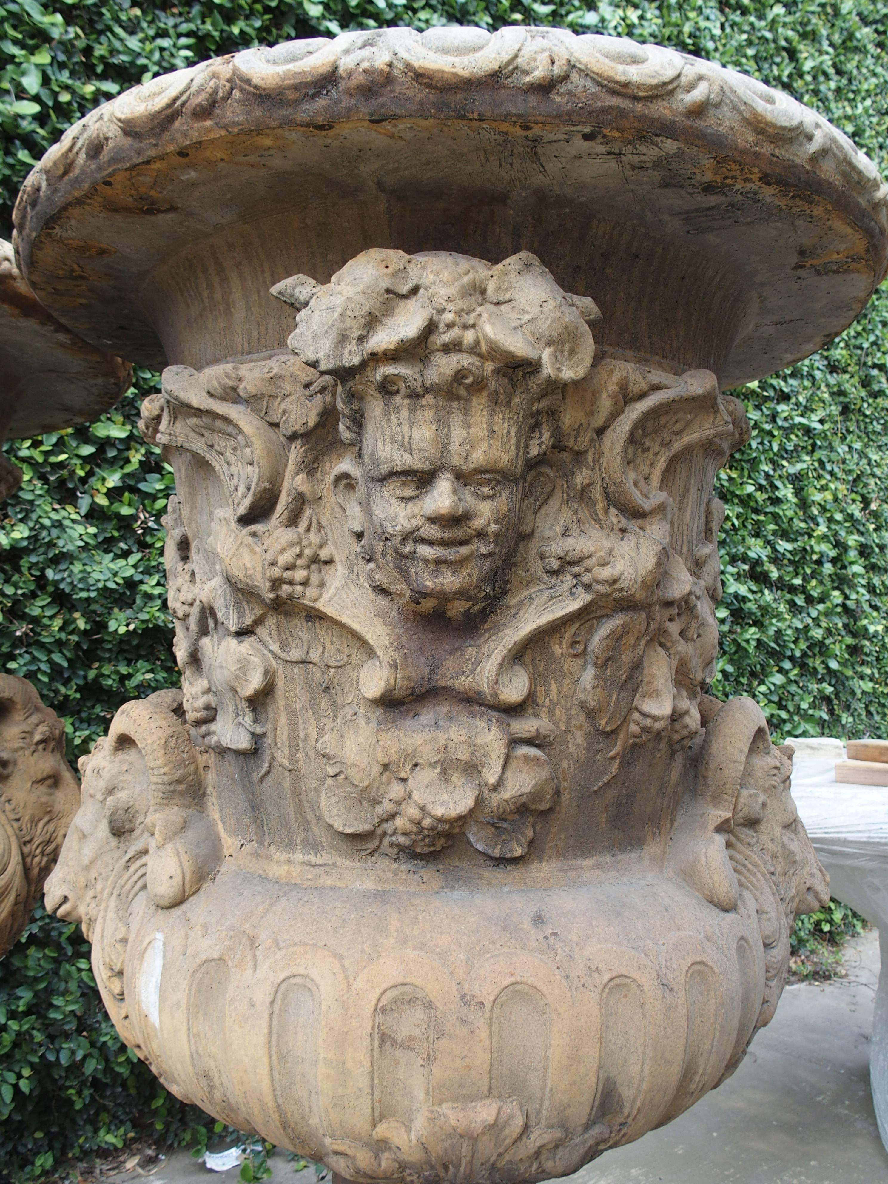 Pair of Large European Cast Garden Urns with Mascarons, Rams Heads, and Grape  In Excellent Condition In Dallas, TX