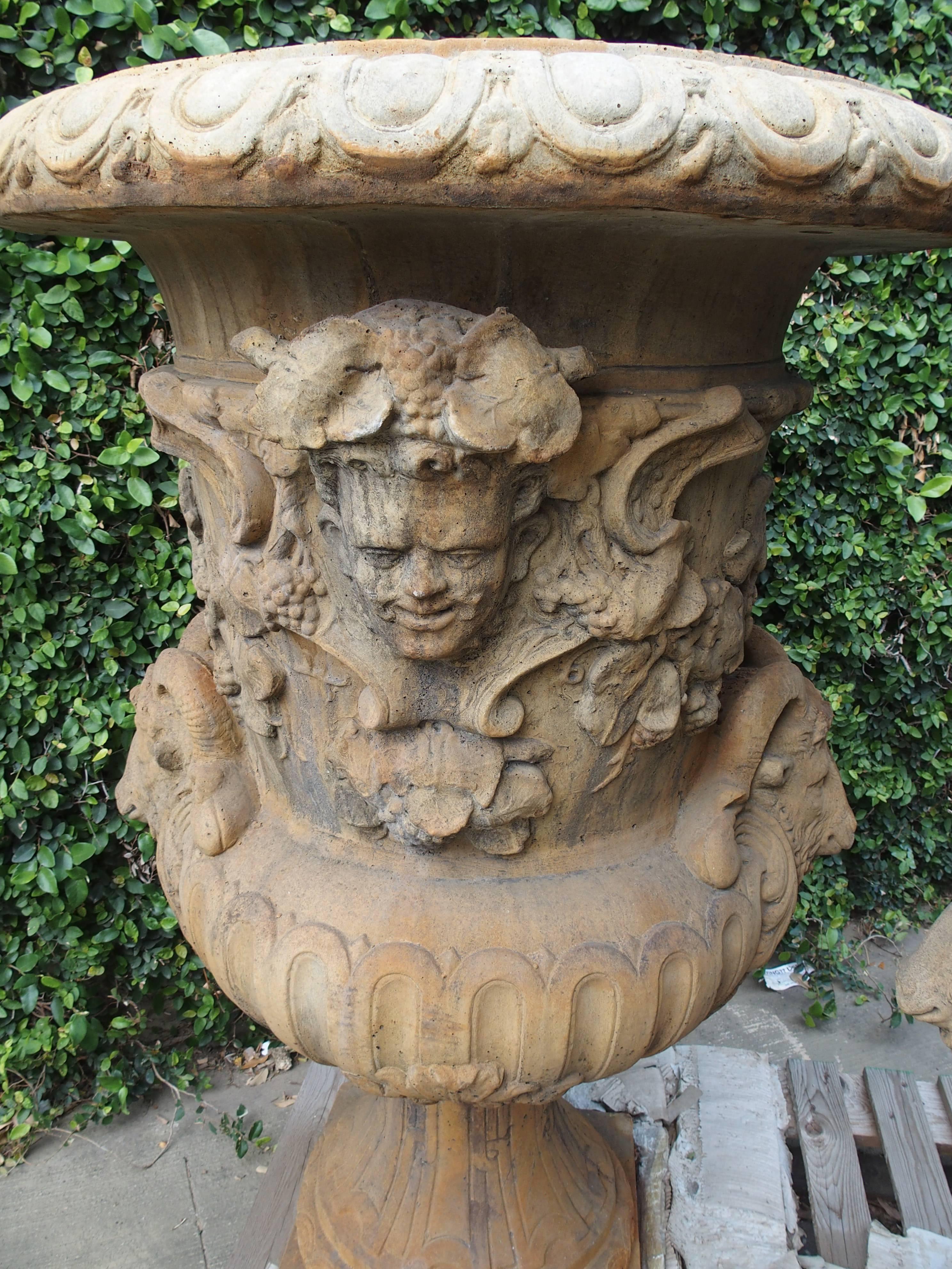 Contemporary Pair of Large European Cast Garden Urns with Mascarons, Rams Heads, and Grape 