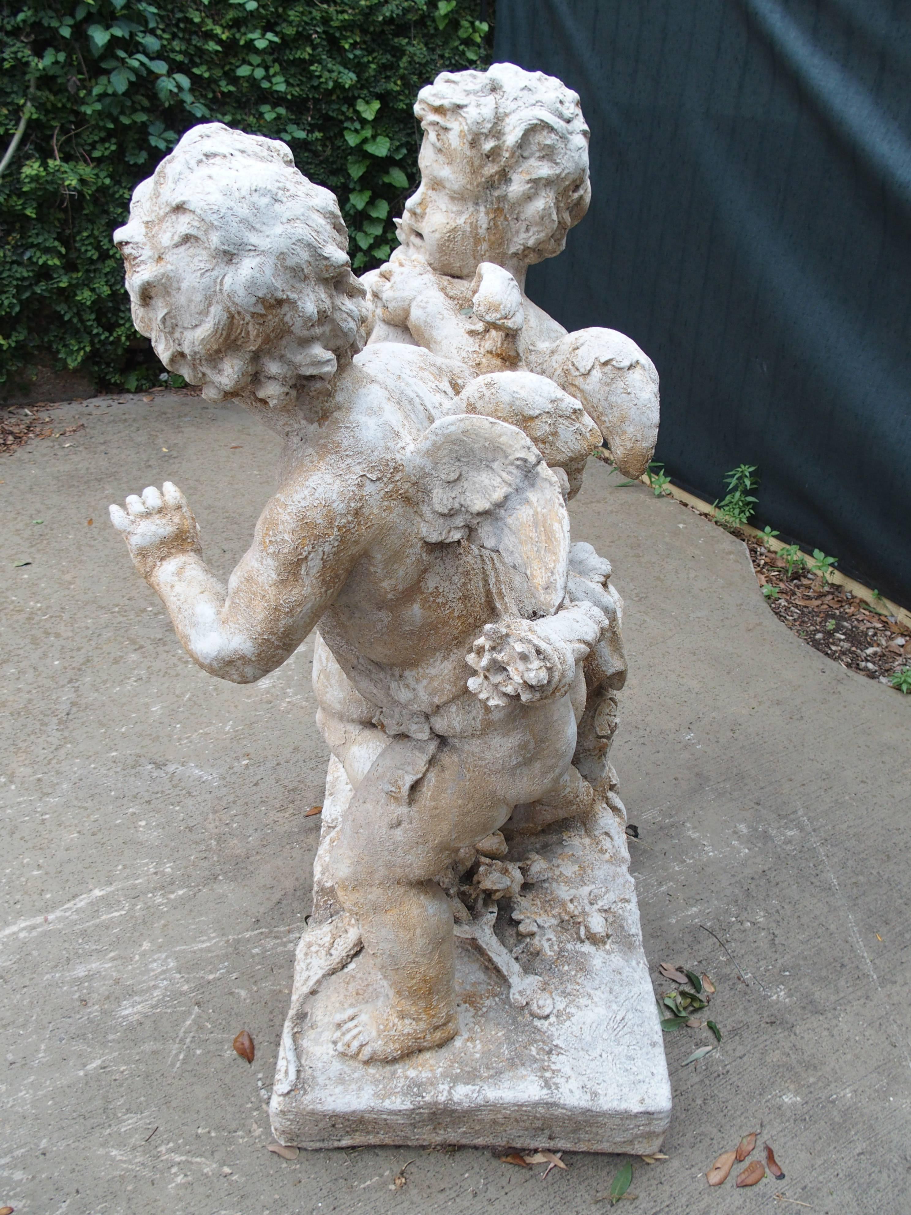 Cast Stone Cupids Garden Statue from France In Good Condition In Dallas, TX