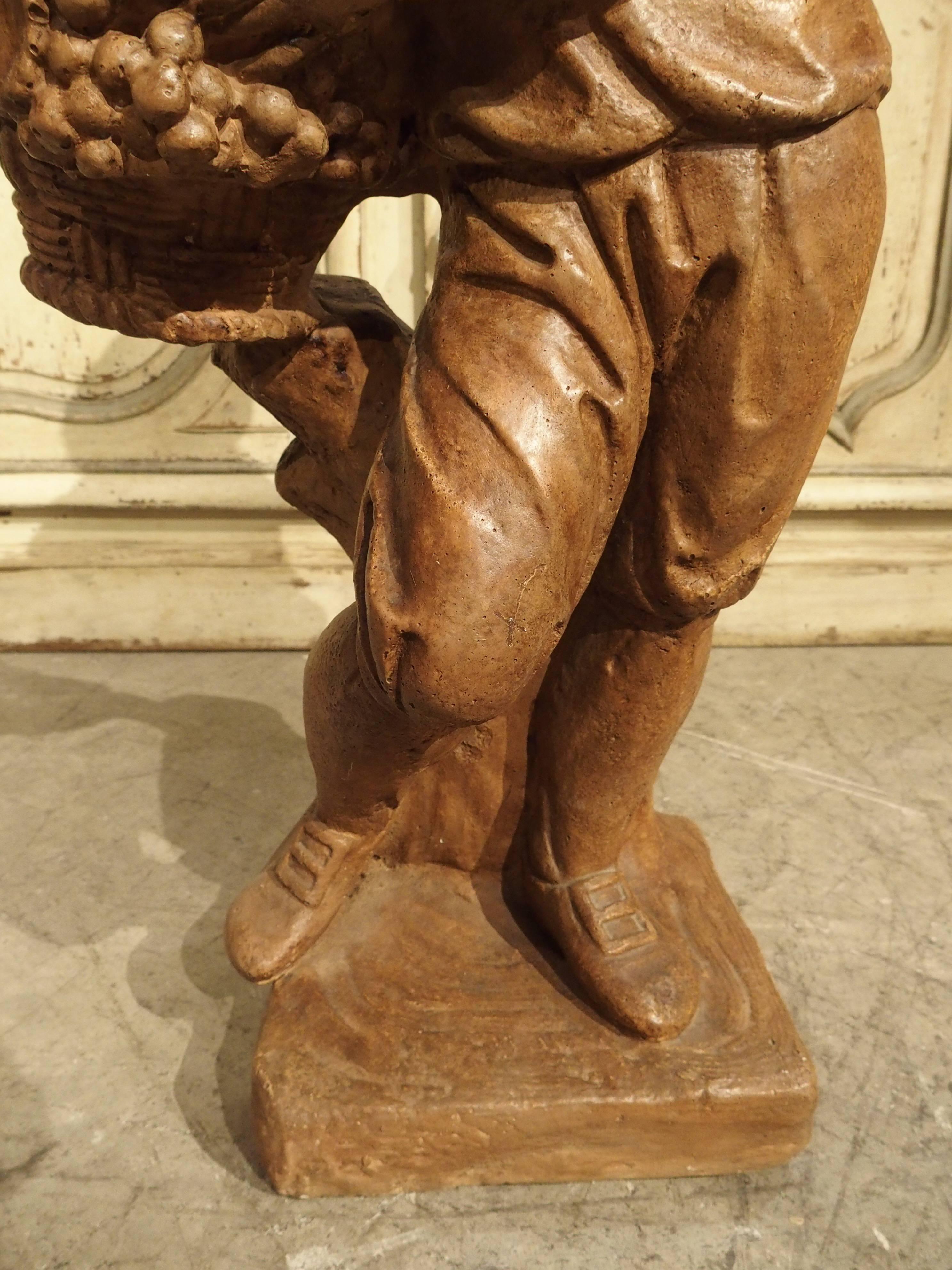 French Vintage Painted Cast Statue of a Boy Holding a Basket of Fruit 1