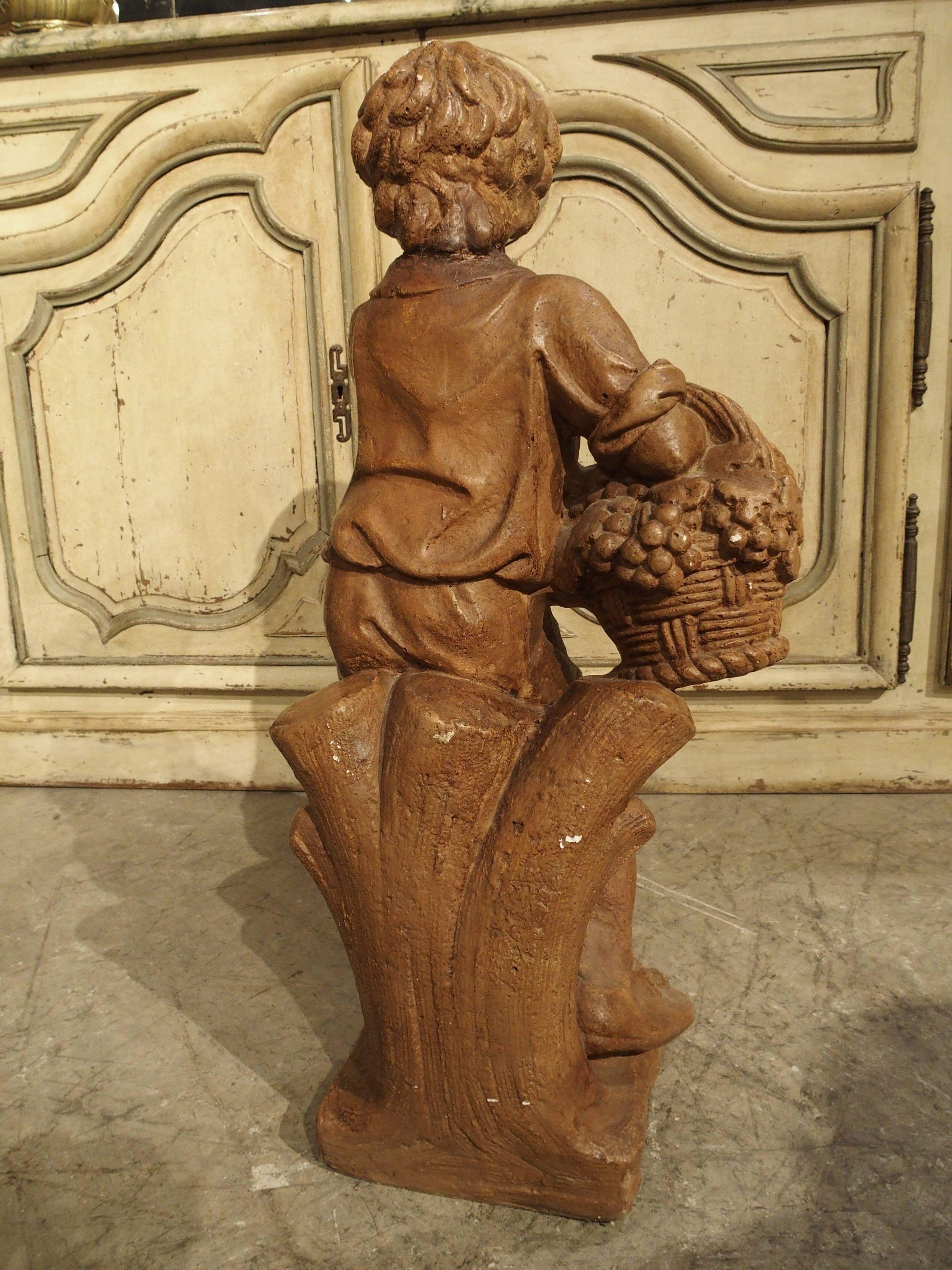 French Vintage Painted Cast Statue of a Boy Holding a Basket of Fruit 2
