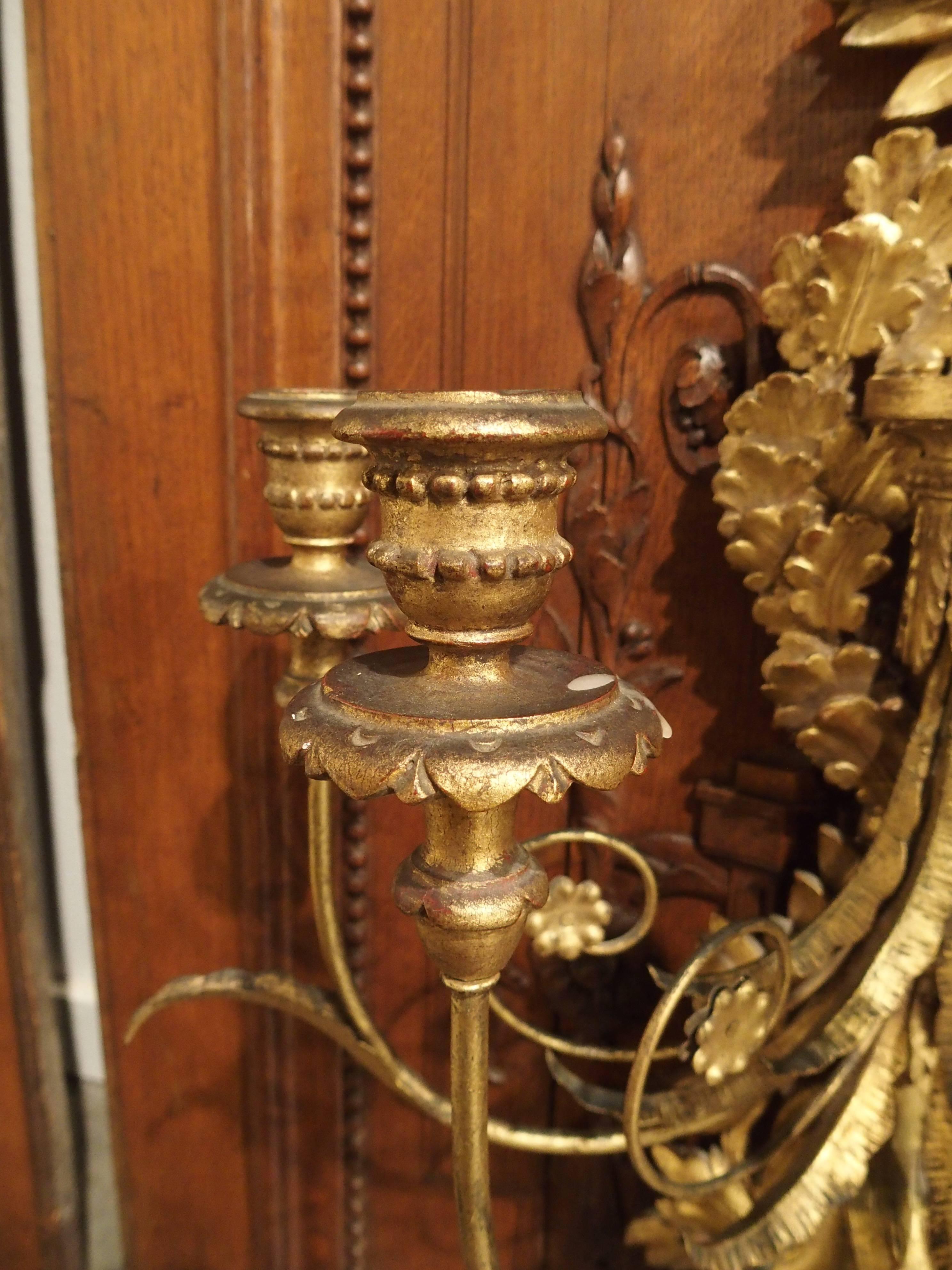 Carved Italian Giltwood and Gilded Wrought Iron Five-Light Trophy Sconce