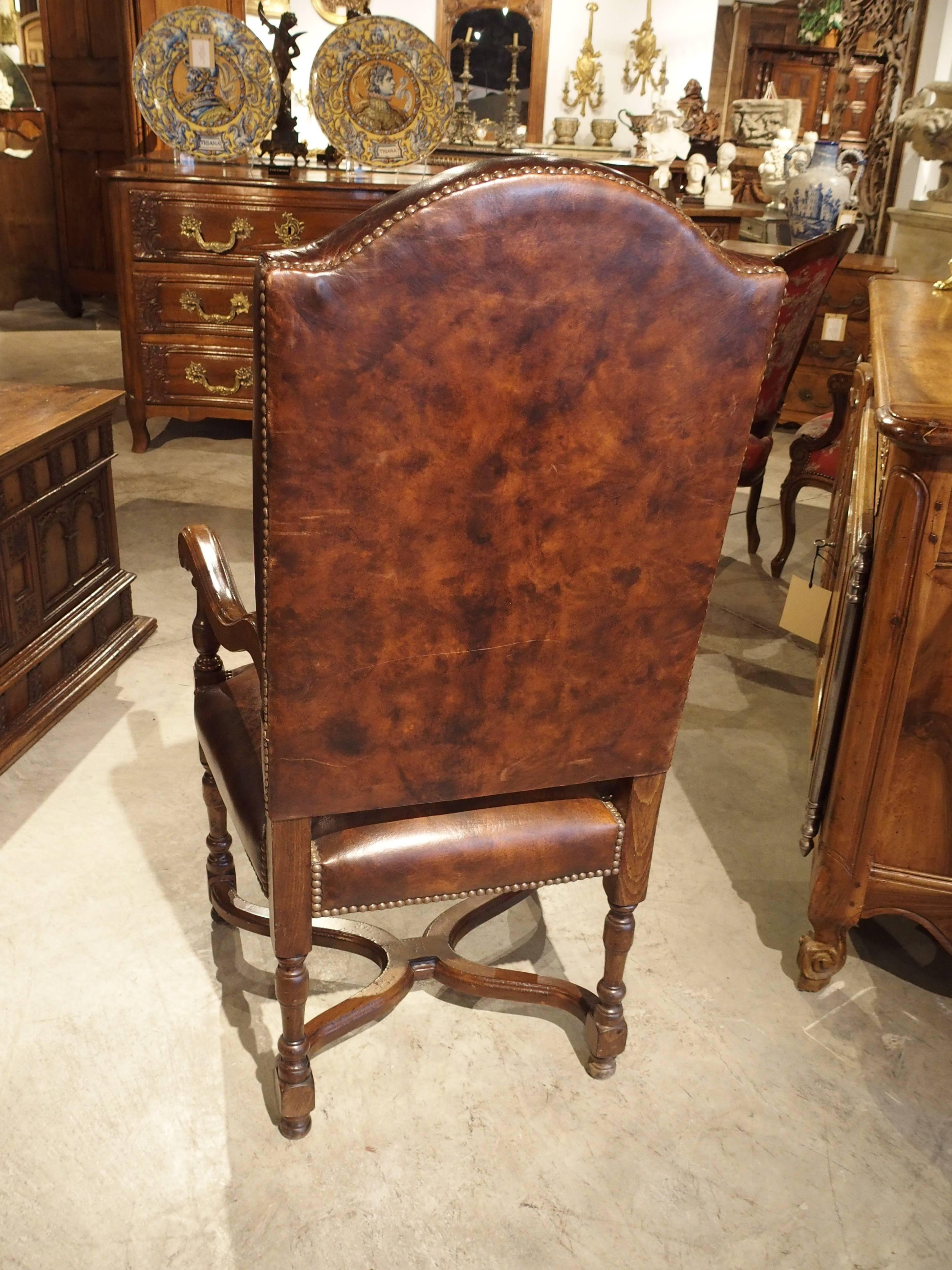 French Embossed Leather Walnut Wood Armchair from France