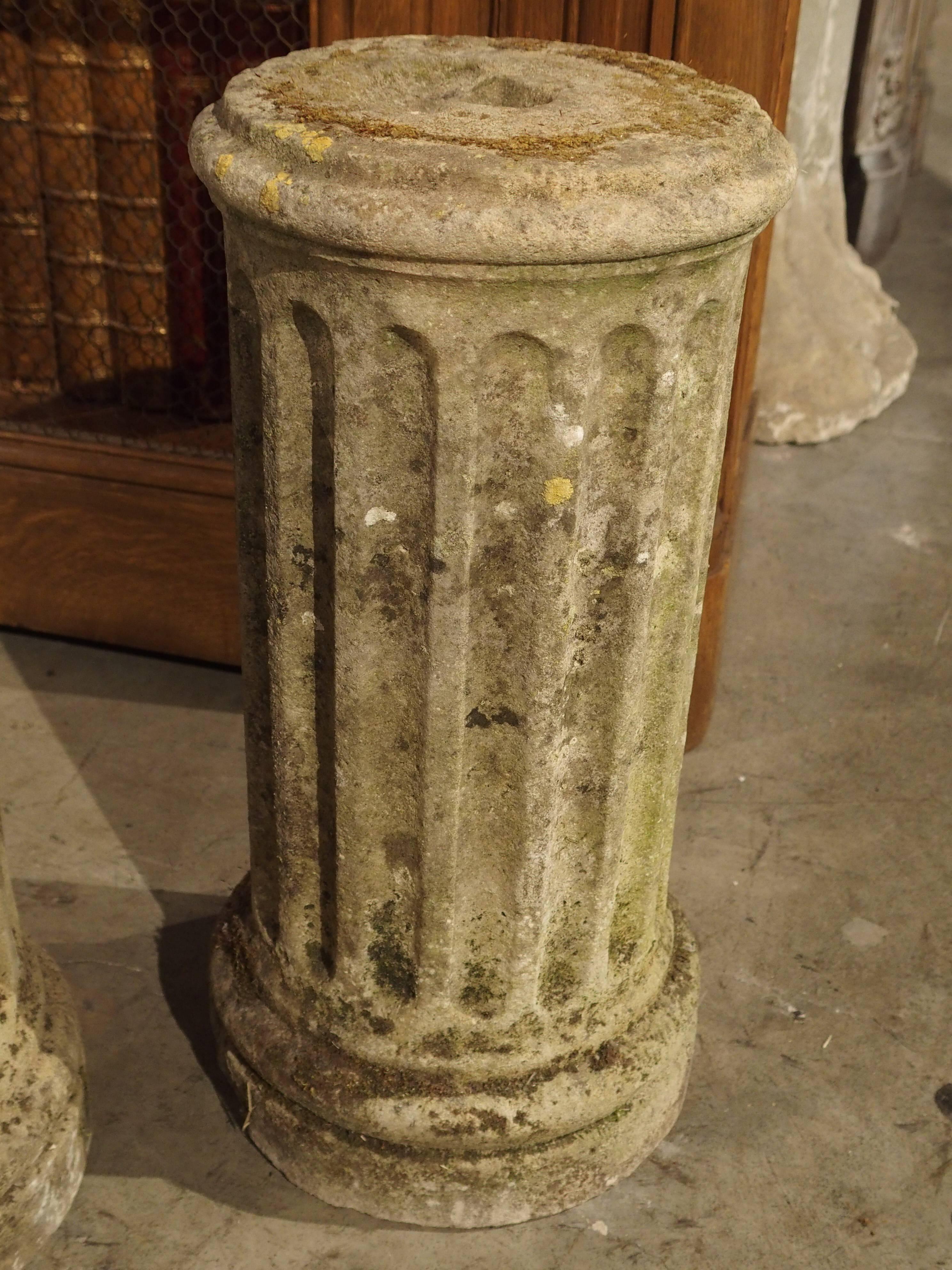 These small Period Louis XVI stone columns are fluted with round tops and bases. They are very old, dating to the late 1700s and are wonderful accessories that can be placed anywhere on their own or as a support for any decorative item. Of course,