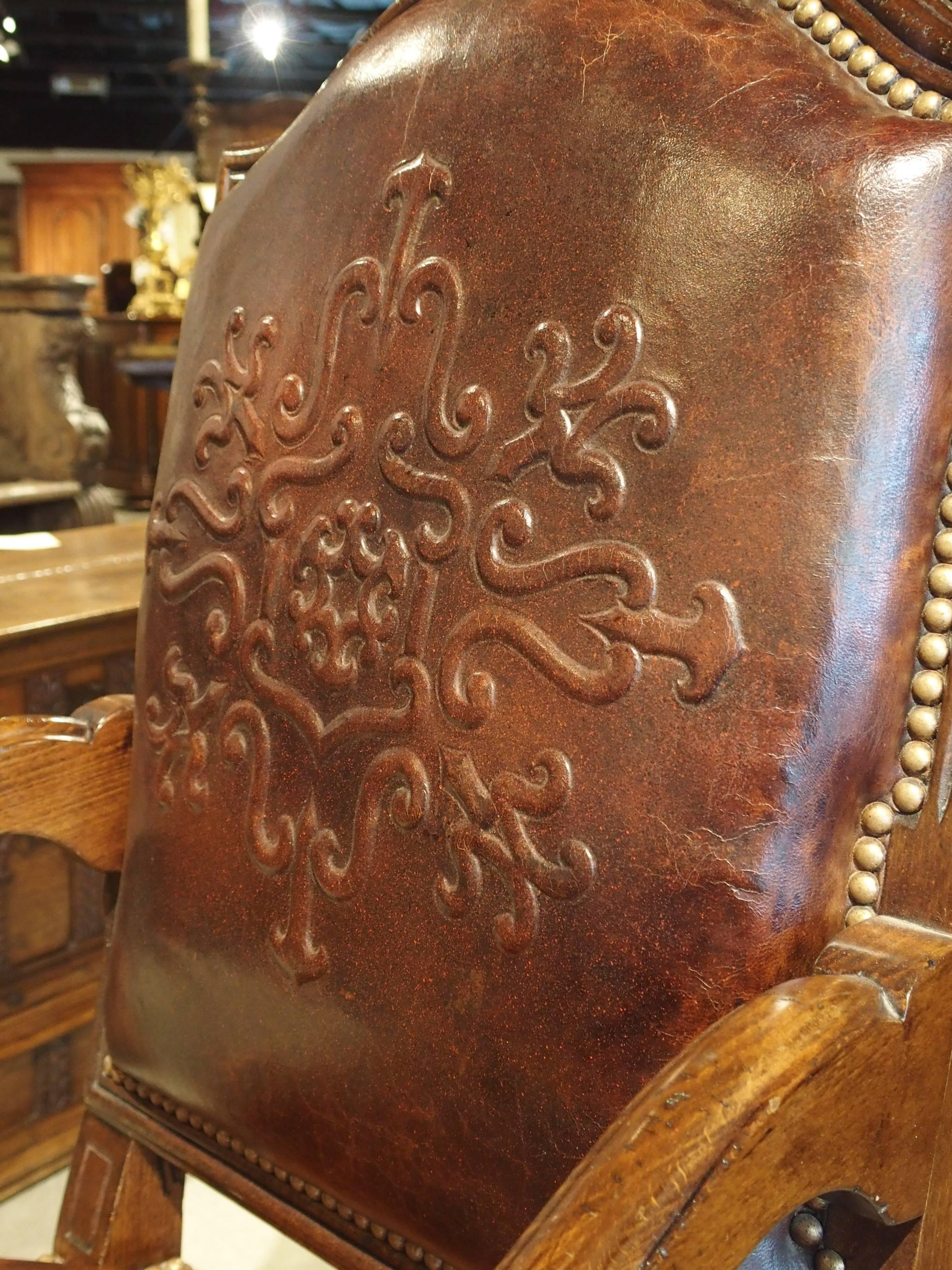 Louis XIV Embossed Leather Walnut Wood Armchair from France