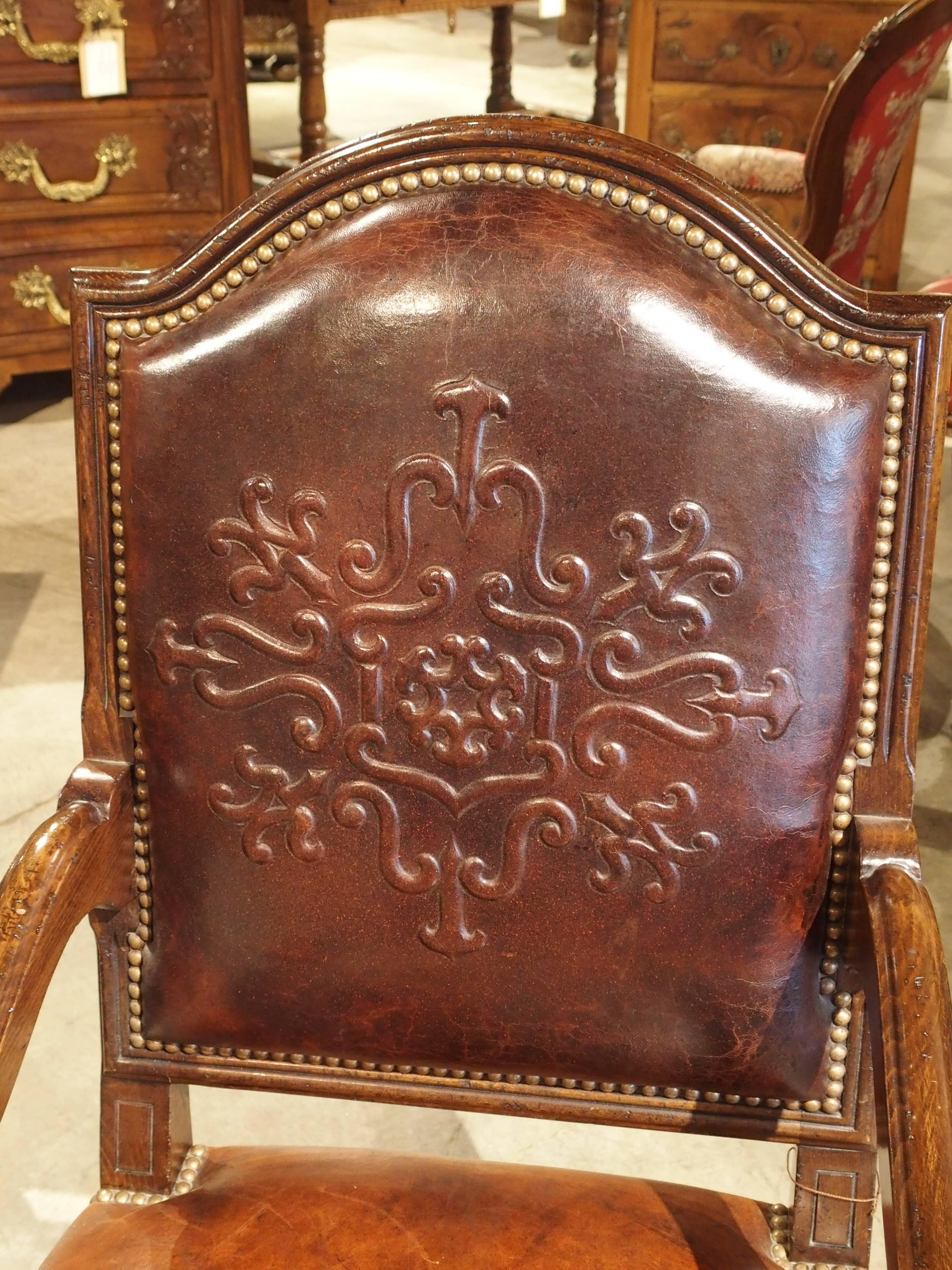 French Embossed Leather Walnut Wood Armchair from France
