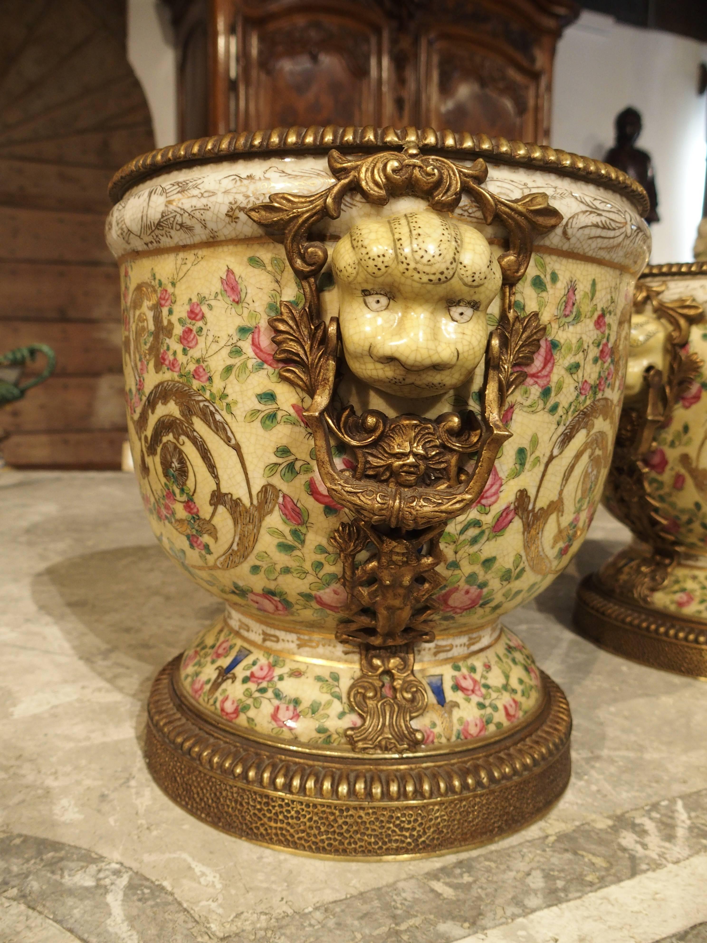 Pair of Painted Porcelain Urns with Gilt Mounts, 20th Century In Good Condition In Dallas, TX