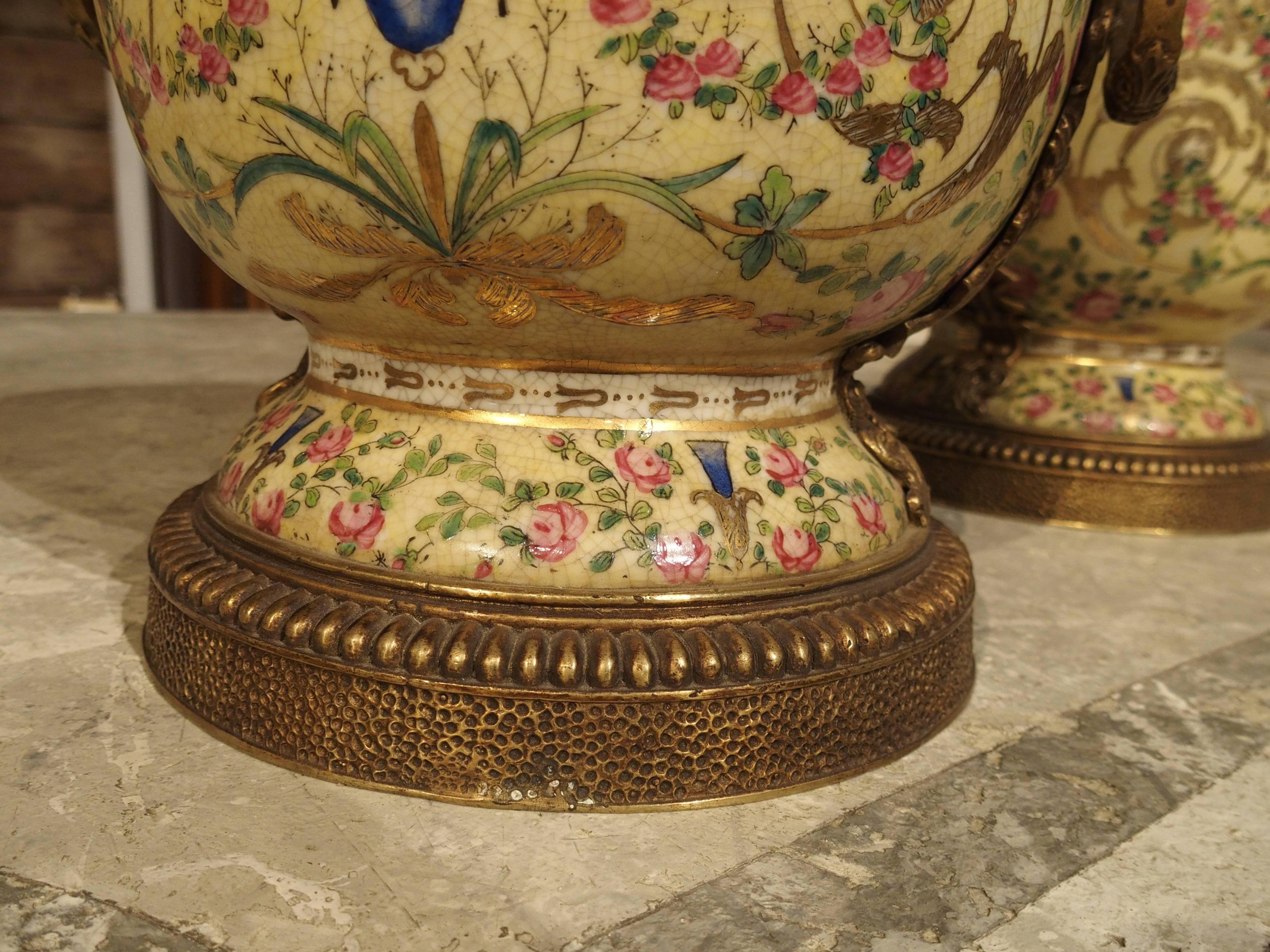 Pair of Painted Porcelain Urns with Gilt Mounts, 20th Century 1