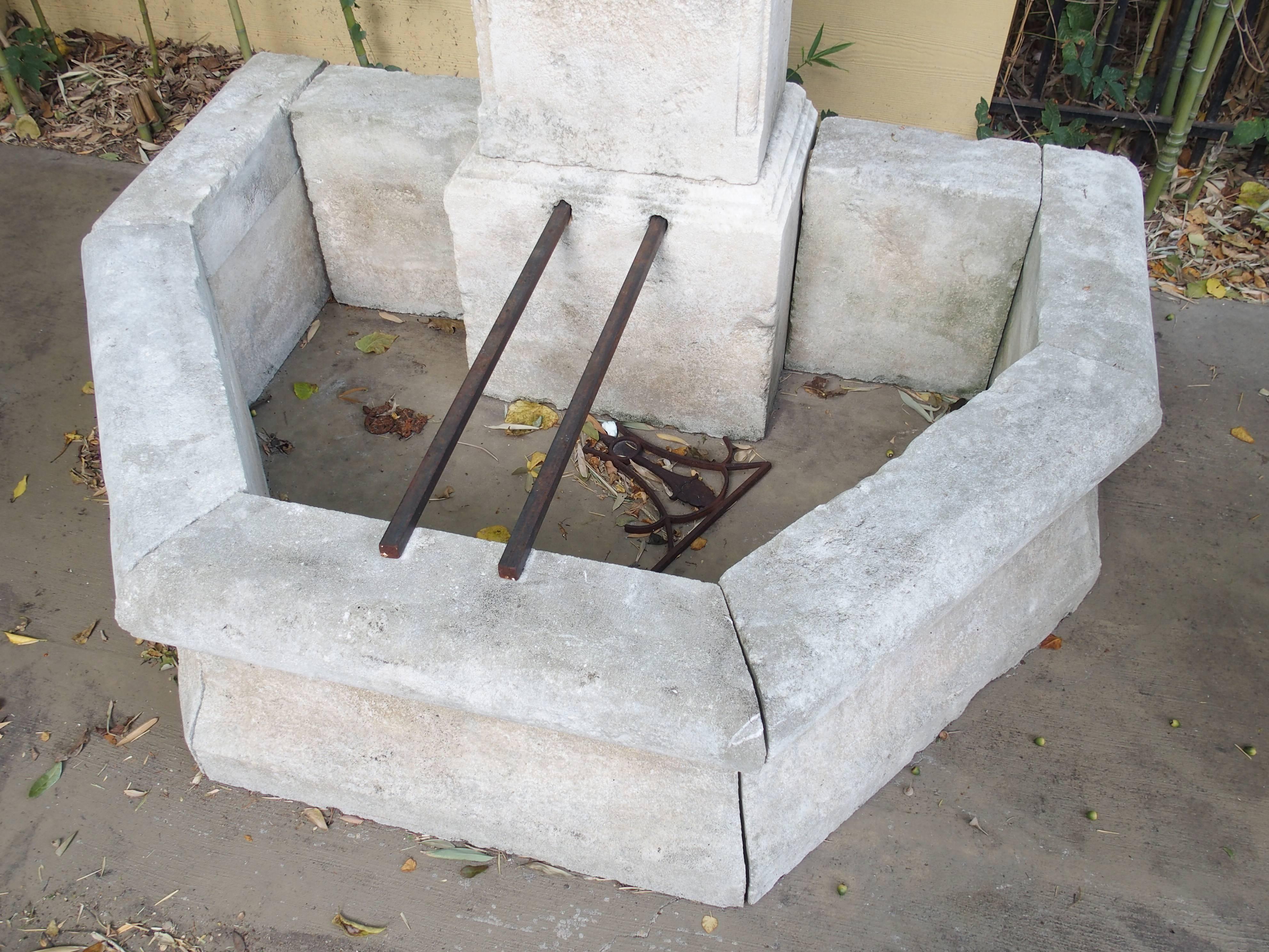 This is a hand-carved fountain from France. It is made in Estaillade limestone, with a soft natural color patina added to stone along with distressed markings. This fountain is not currently mortared together, so it can be taken apart for