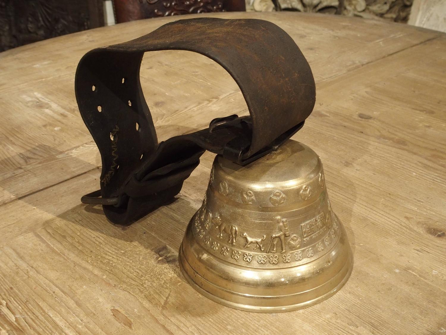 Early to Mid1900s Swiss Cow Bell with Original Leather Collar For Sale