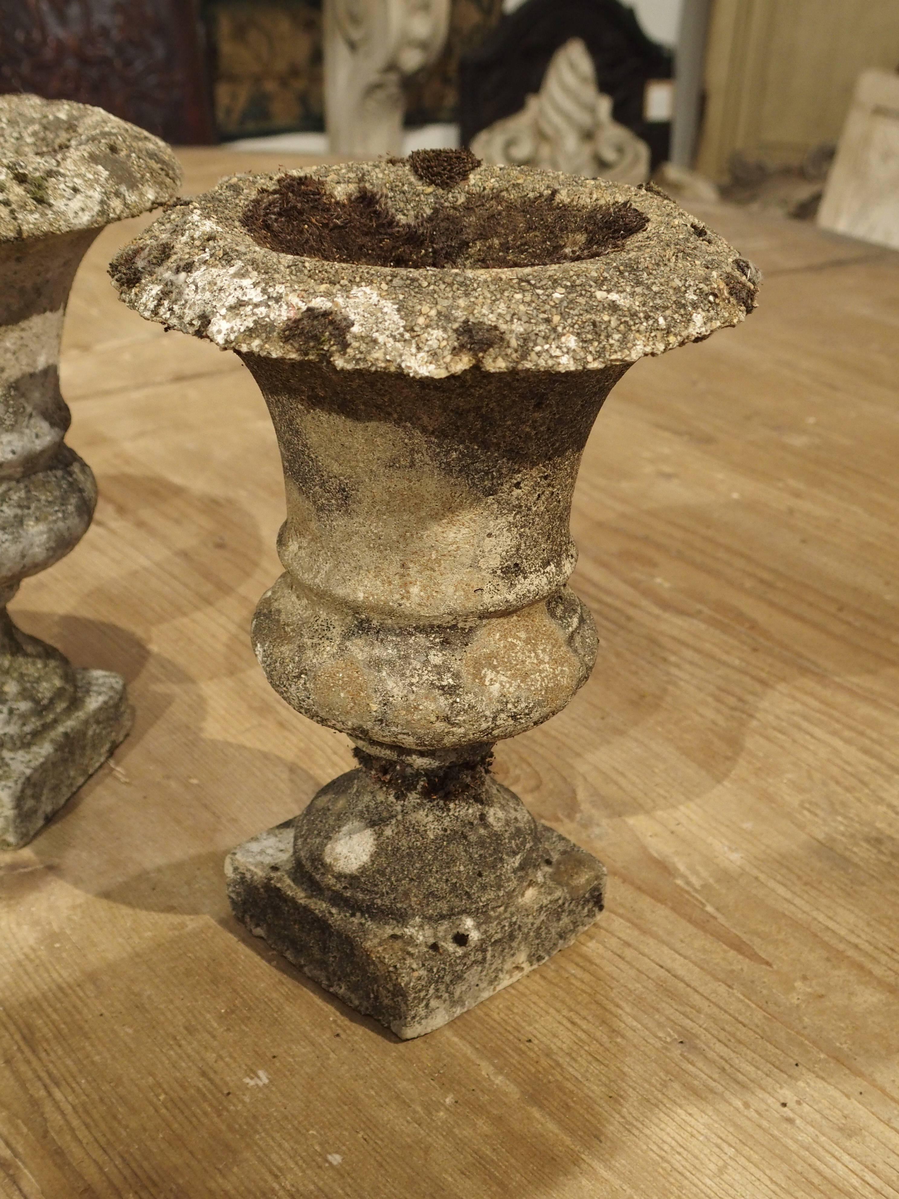 French Set of Three Small Reconstituted Stone Urns from France, circa 1900