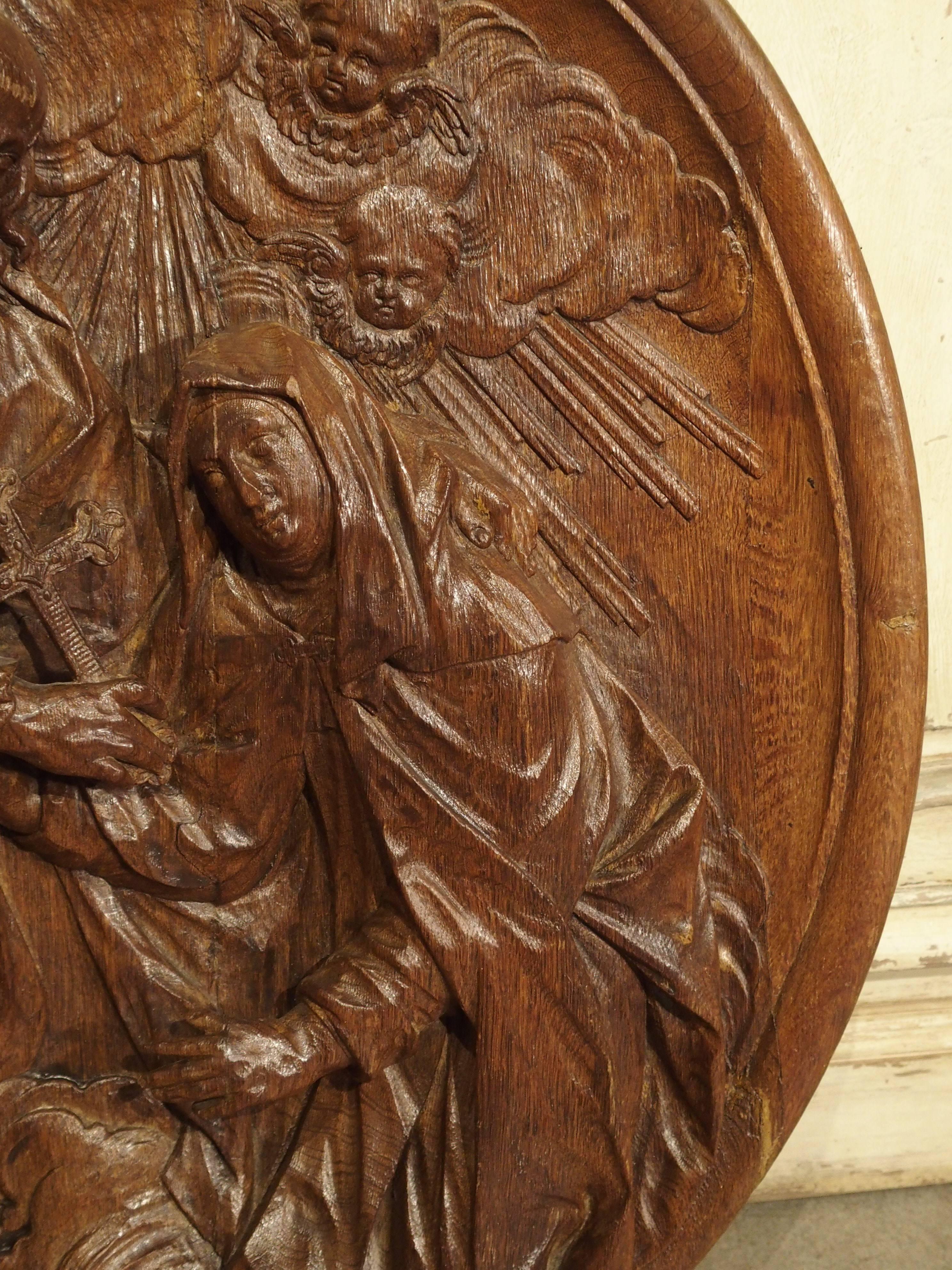 Carved 18th Century Oval Wooden Religious Plaque from France In Good Condition In Dallas, TX