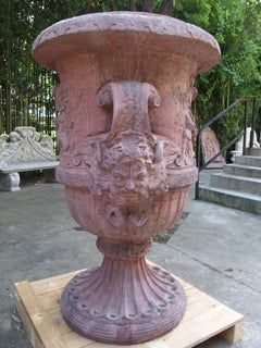 Pair of Large French Terra Cotta Colored Cast Stone Urns