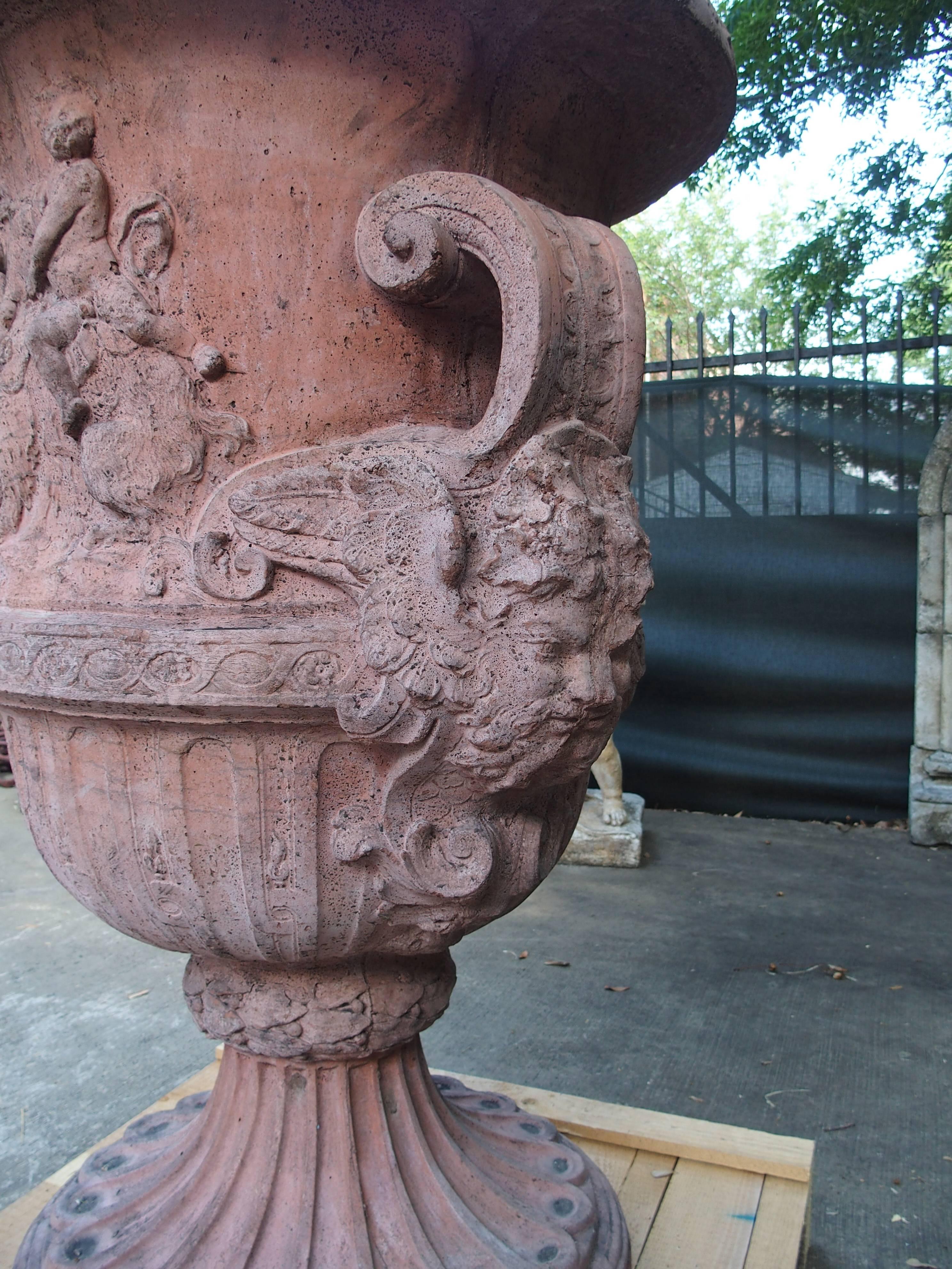 Pair of Large French Terra Cotta Colored Cast Stone Urns In Good Condition In Dallas, TX