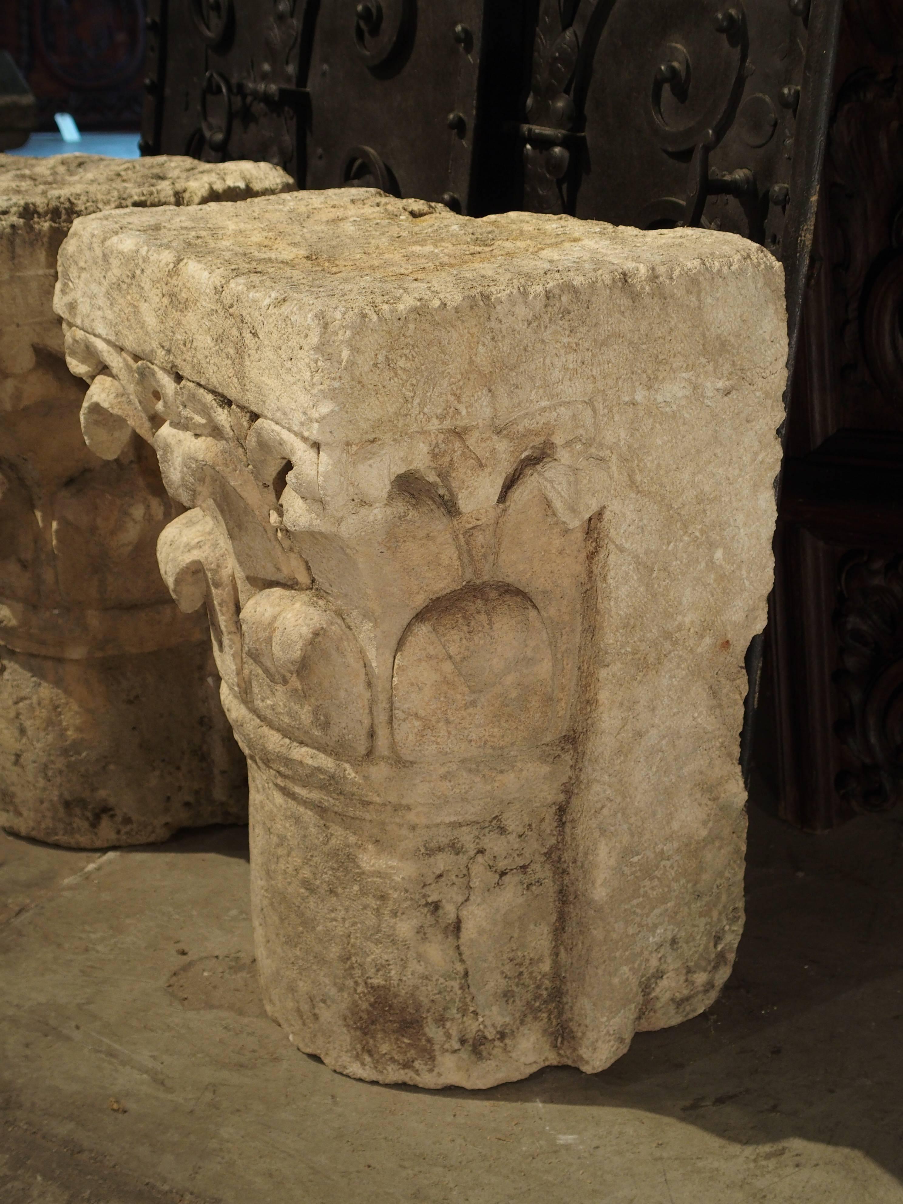 Carved stone, circa 1800

These hand-carved pilaster capitals were recently salvaged from a property around Lyon, France. They are a stylized version of the Corinthian capital. Pilasters are shallow capitals/columns that would have been attached