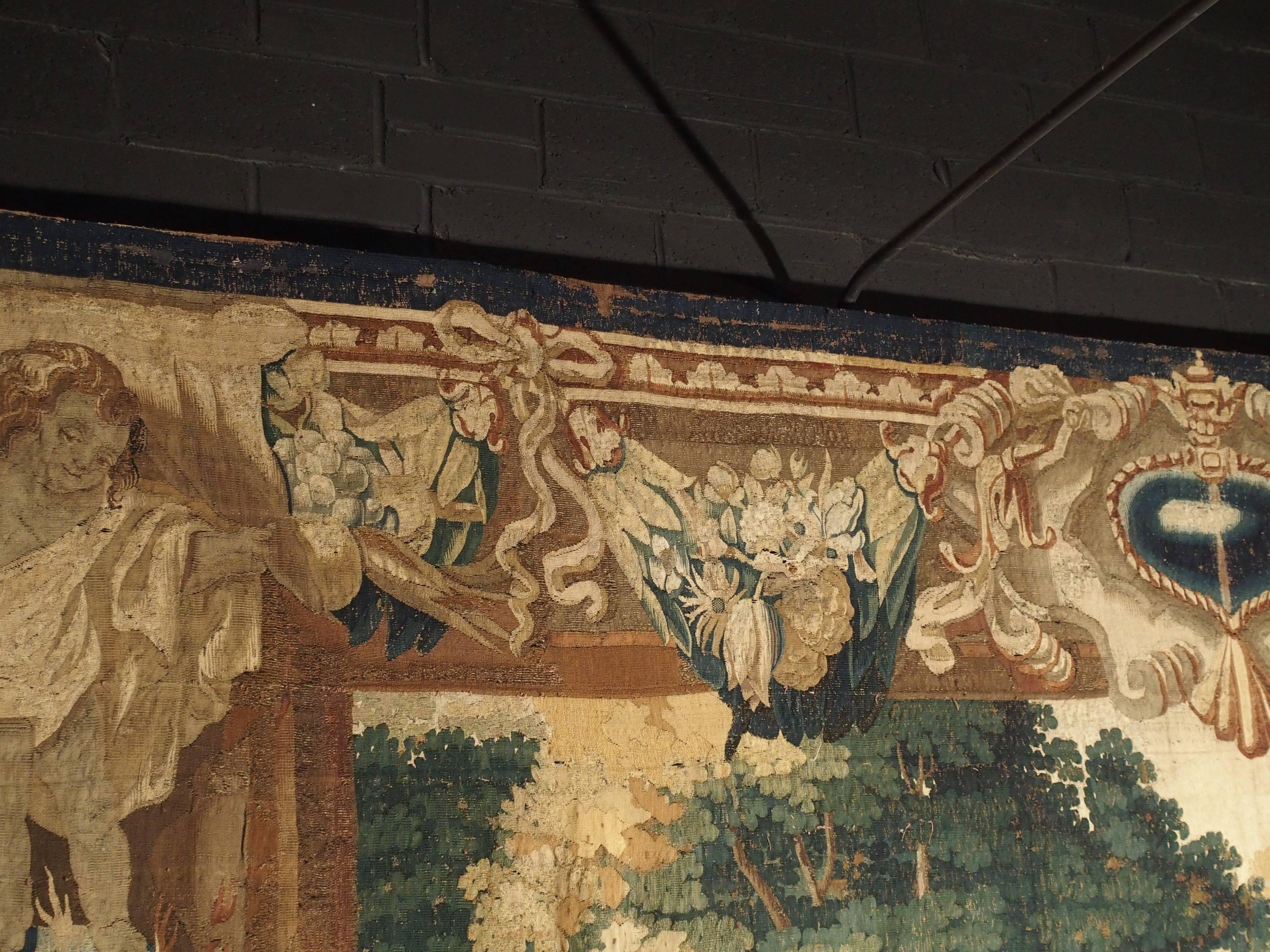 This is a rare Brussels tapestry by the well-known maker, Ian Van Leefdael, circa 1640. On the lower right border, we see his signature, along with a B B, which signifies Brabant Brussels. In 1528, it became a requirement for workshops to weave in