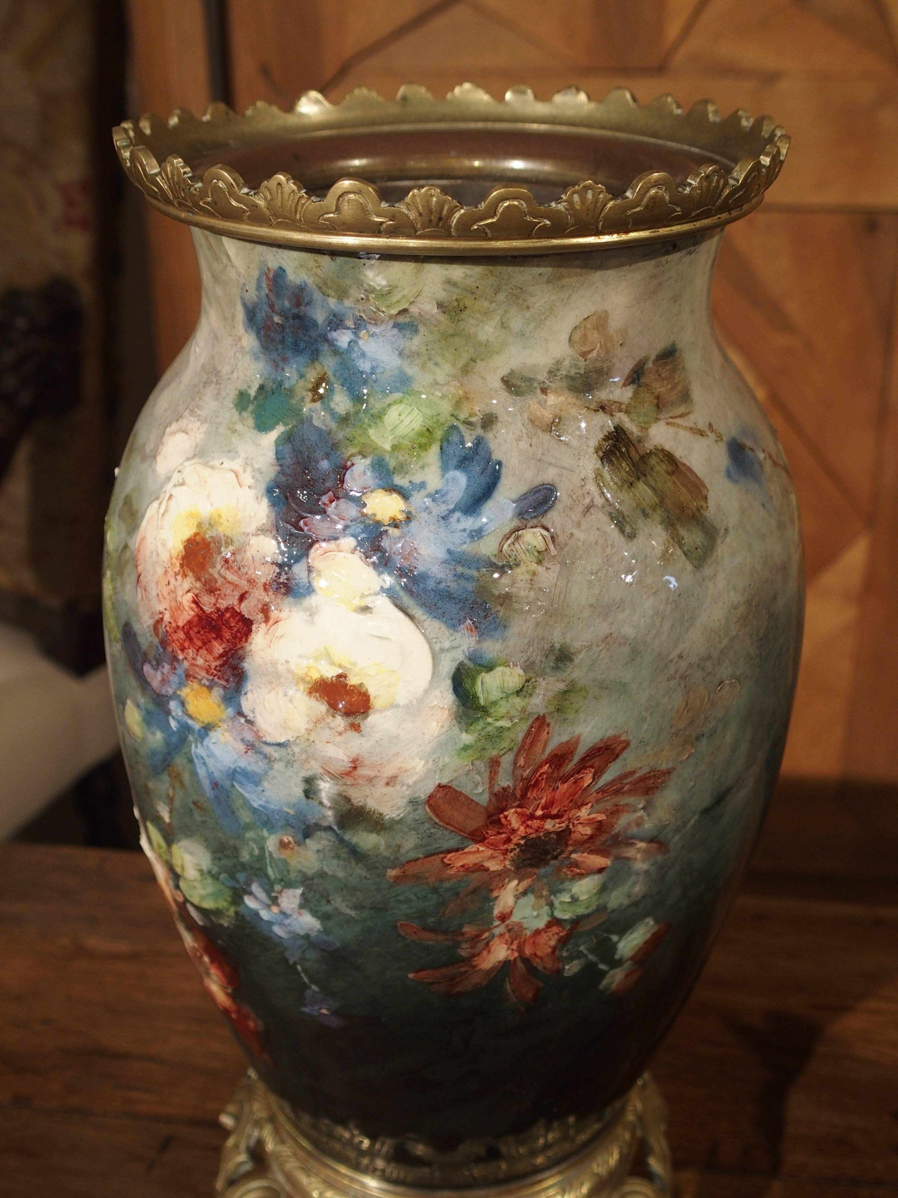 Theodore LeFront bagan working with Faience (tin glazed earthenware), Barbotine (earthenware decorated with colored liquid slips in an impasto style inspired by Impressionism) and porcelain in an atelier in Fontainbleau in 1860. He had several
