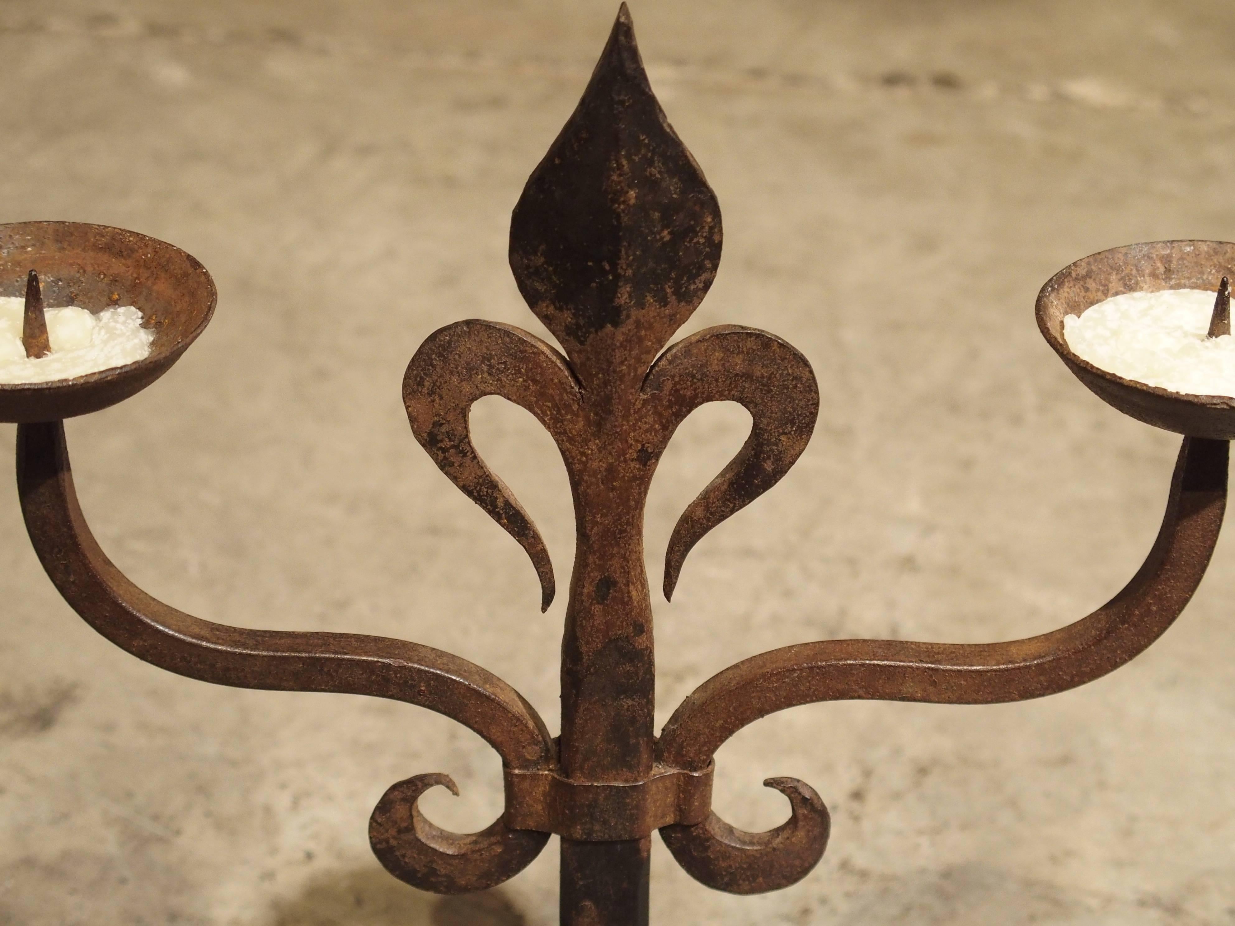 20th Century Pair of French Fleur De Lys Forged Iron Candelabras