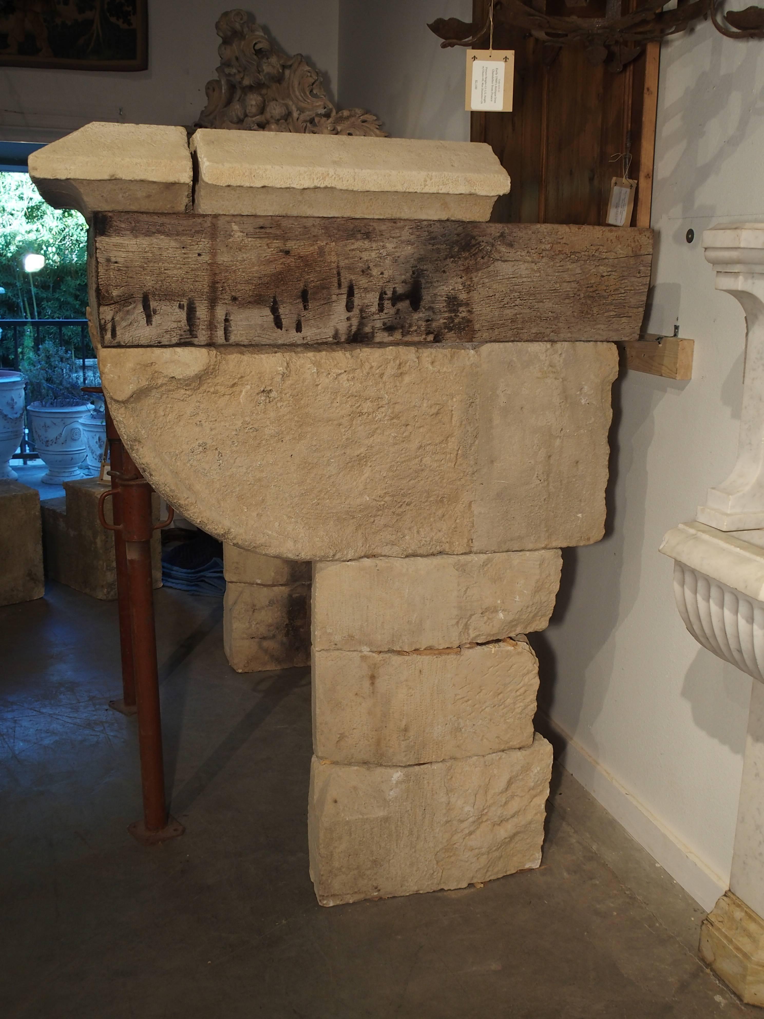 18th Century and Earlier Rare 15th/16th Century Limestone and Oak Fireplace from France