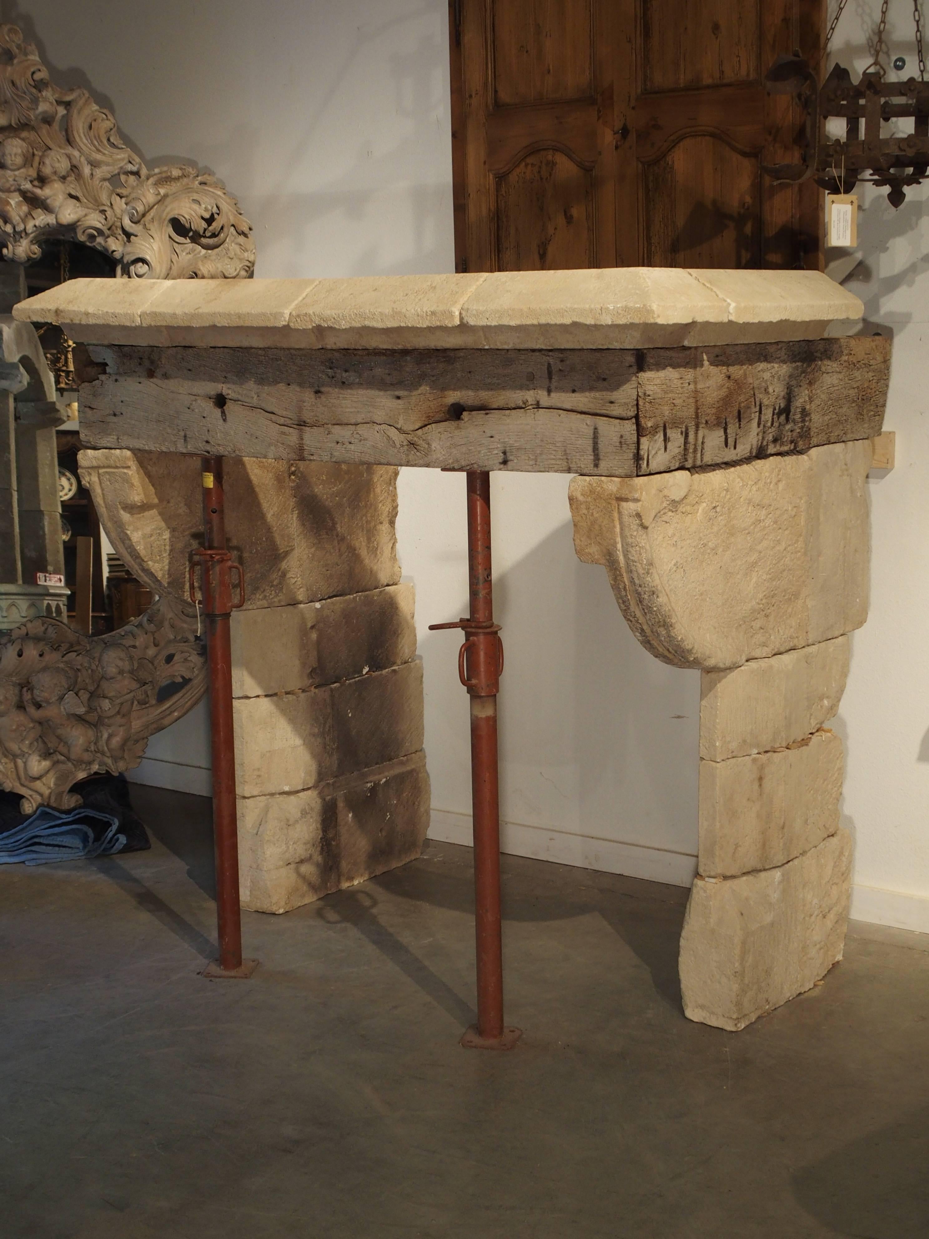 Rare 15th/16th Century Limestone and Oak Fireplace from France 1