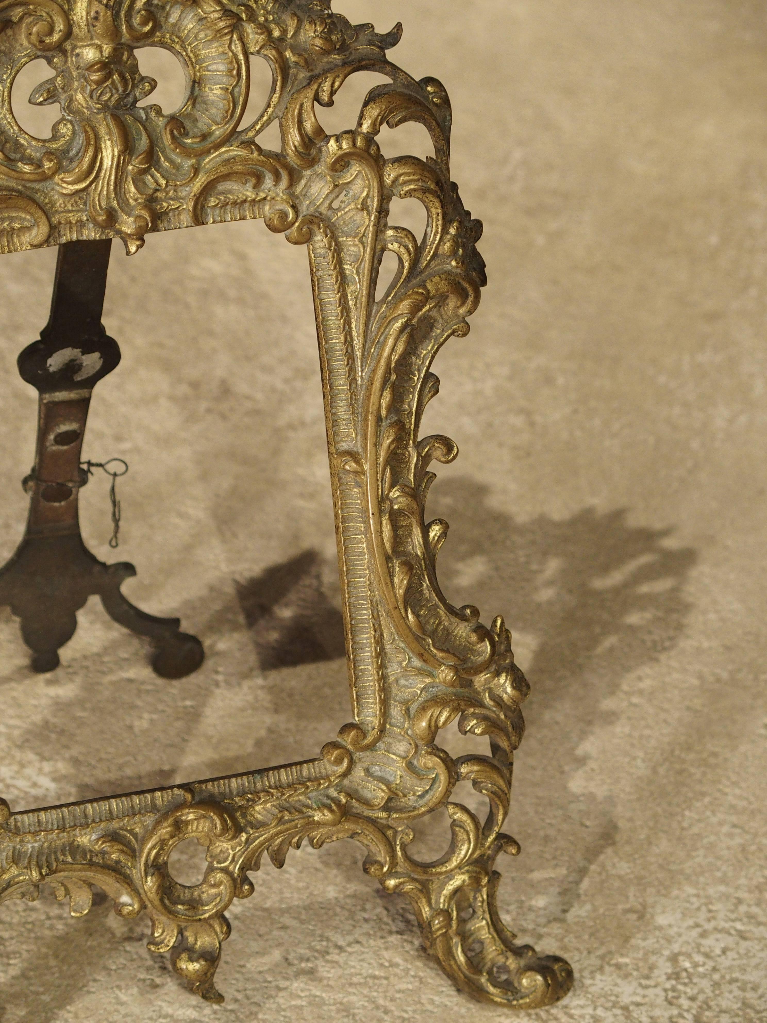 This small antique French, Louis XV style picture frame is perfect for small paintings or photographs. It has all the motifs typical of the Louis XV style: stylized shells, gadrooned leaves C and S scrolls, acanthus leaves, and flowers. Perfect for