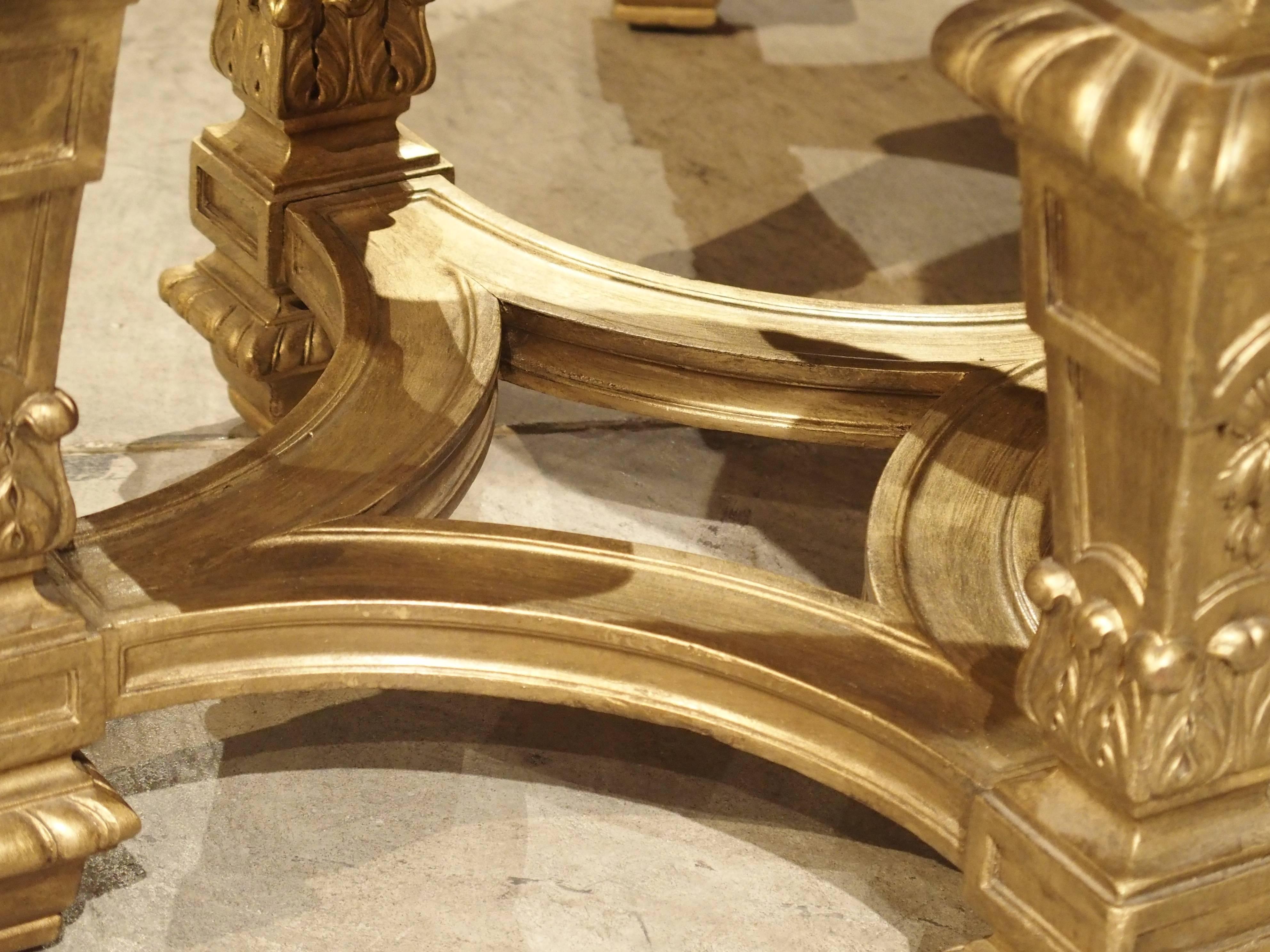 These beautiful early 20th century French giltwood and marble side tables feature Louis XIV motifs. The light cream colored marble has subtle veining which blends nicely with the giltwood décor. The Louis XIV square baluster legs have rectangular