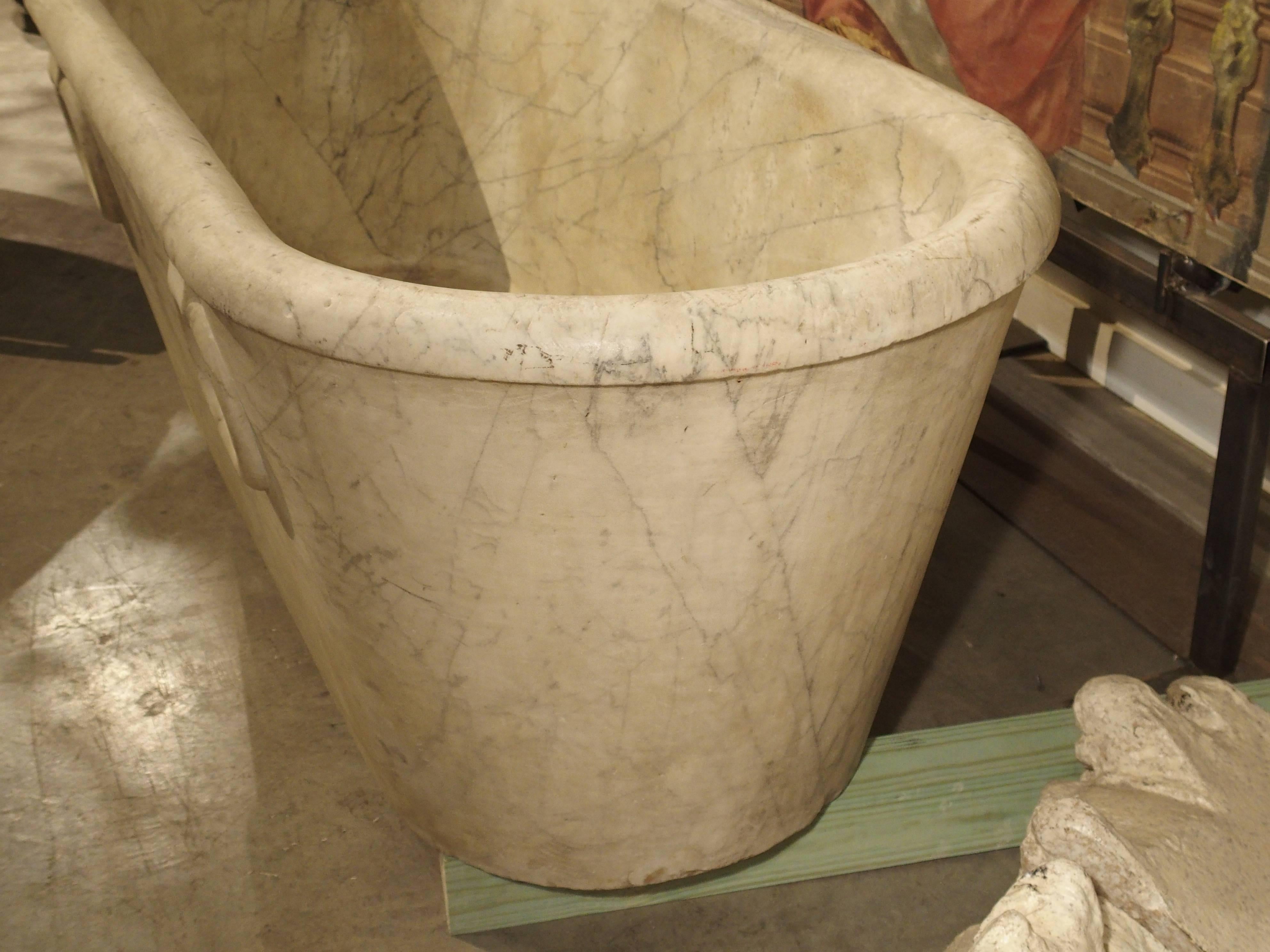 This stunning carrara marble bathtub was recently pulled from an estate in Genoa, Italy, and dates to the beginning of the 19th century. It has been carved from one solid piece of marble, and unlike other marble tubs of similar style, there is a