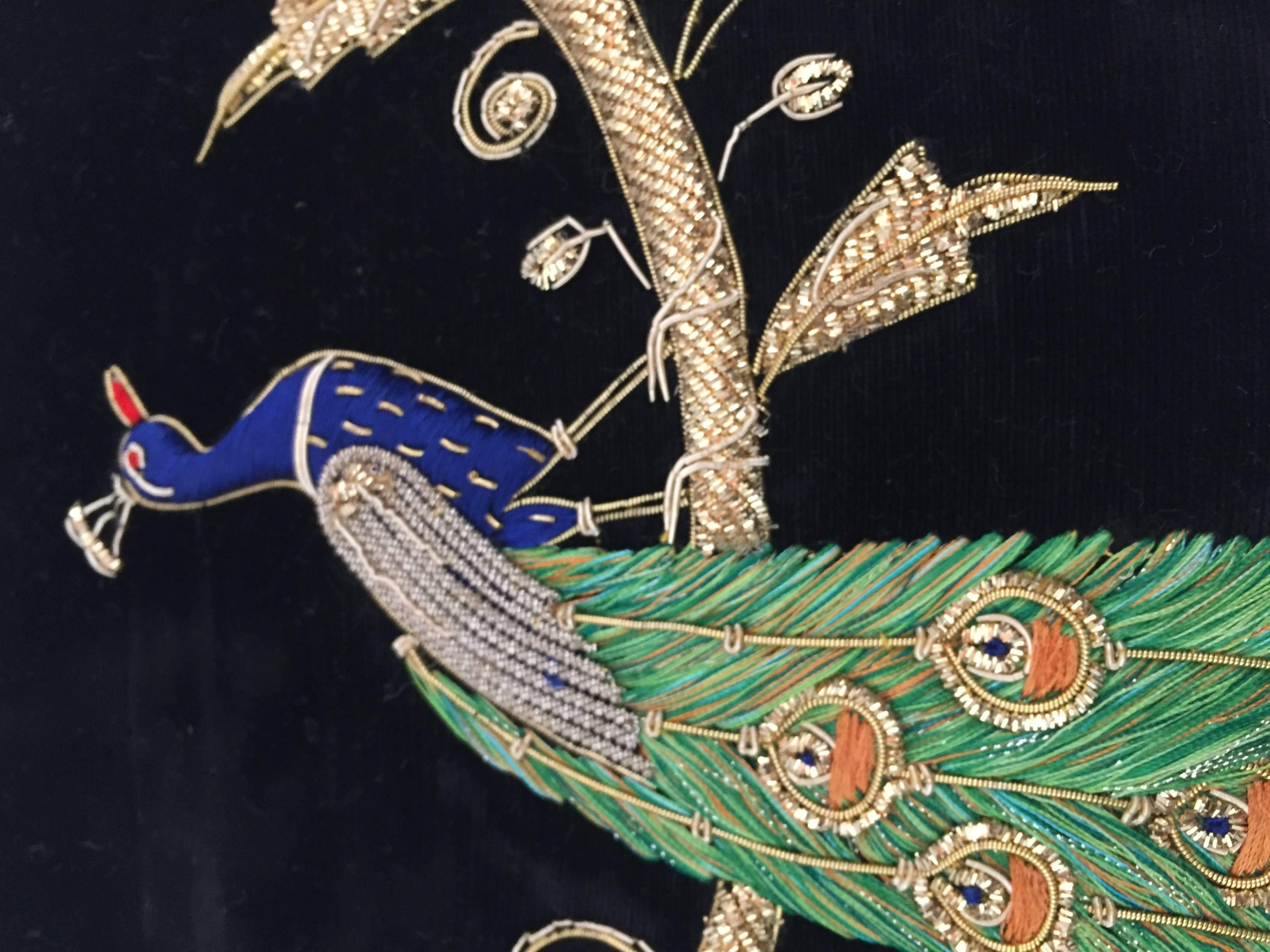 Velvet black silk pillow hand embroidered with gold threads and sequins depicting a royal peacock on a branch.
Gold, green, indigo blue and ruby red with turquoise pearl.
Handcrafted throw pillow.
2 pillows available in the same design.
Price is for