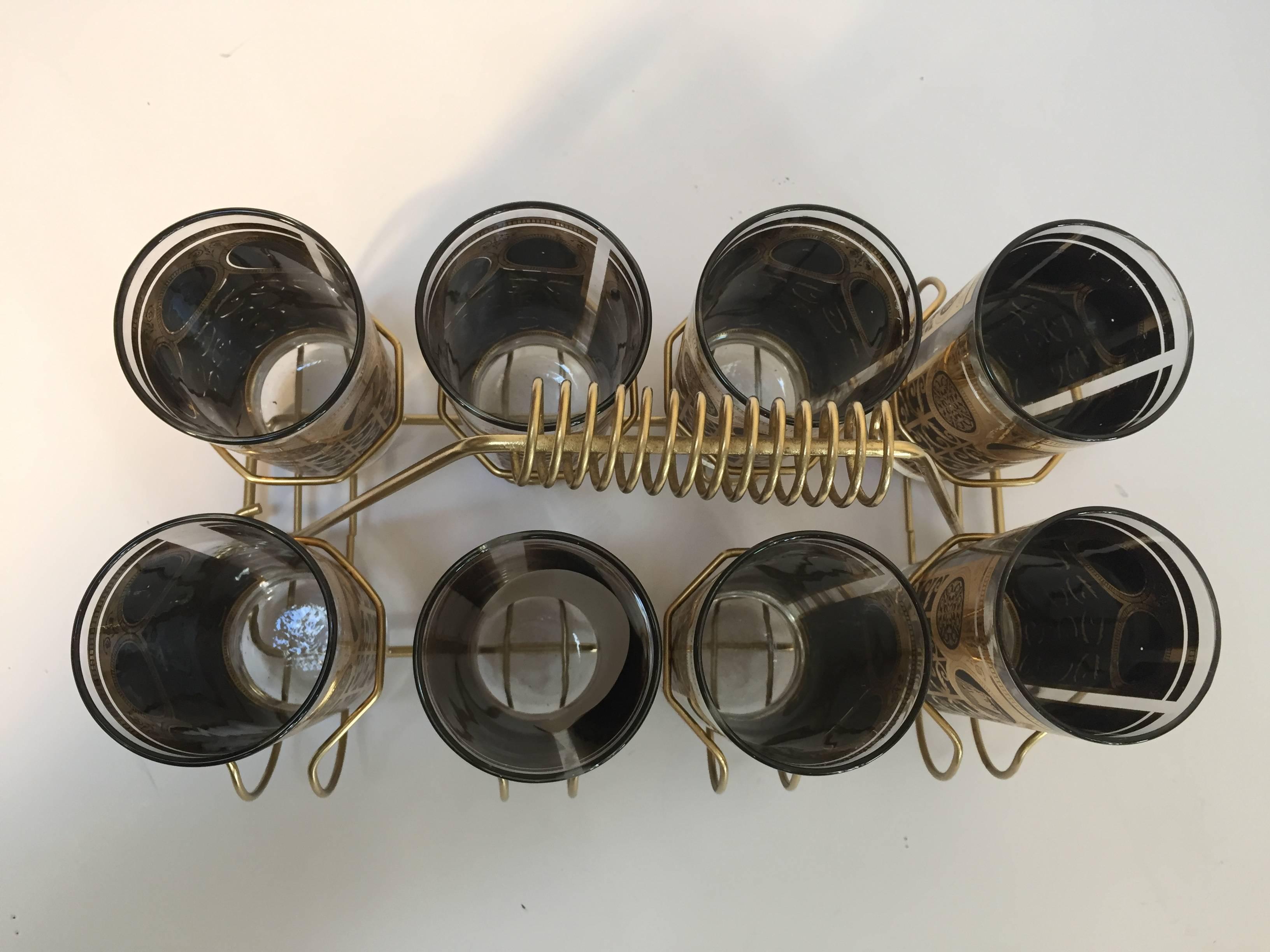 Mid-Century Modern Vintage Eight Highball Black and Gold Glasses in a Brass Cart by Fred Press