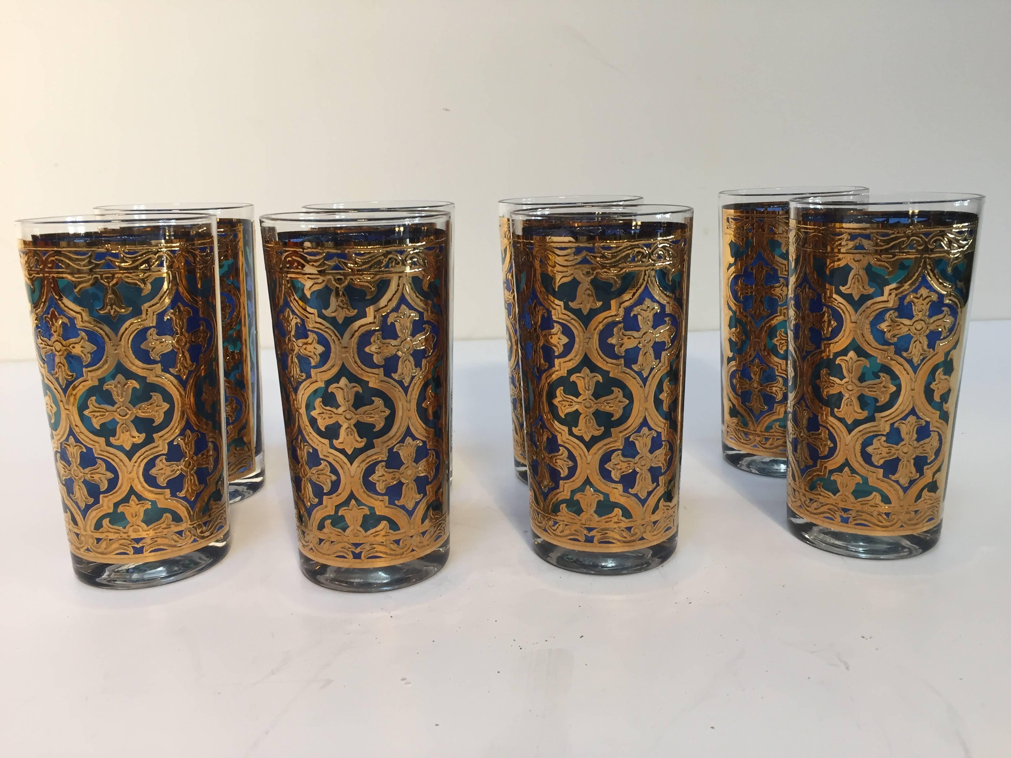 Elegant exquisite vintage set of eight highball glasses designed by Georges Briard.
The glasses are decorated with gold leaf and Moroccan blue designs.
Excellent vintage condition, with 22-karat gold leaf Moorish design like new.
Fantastic mid
