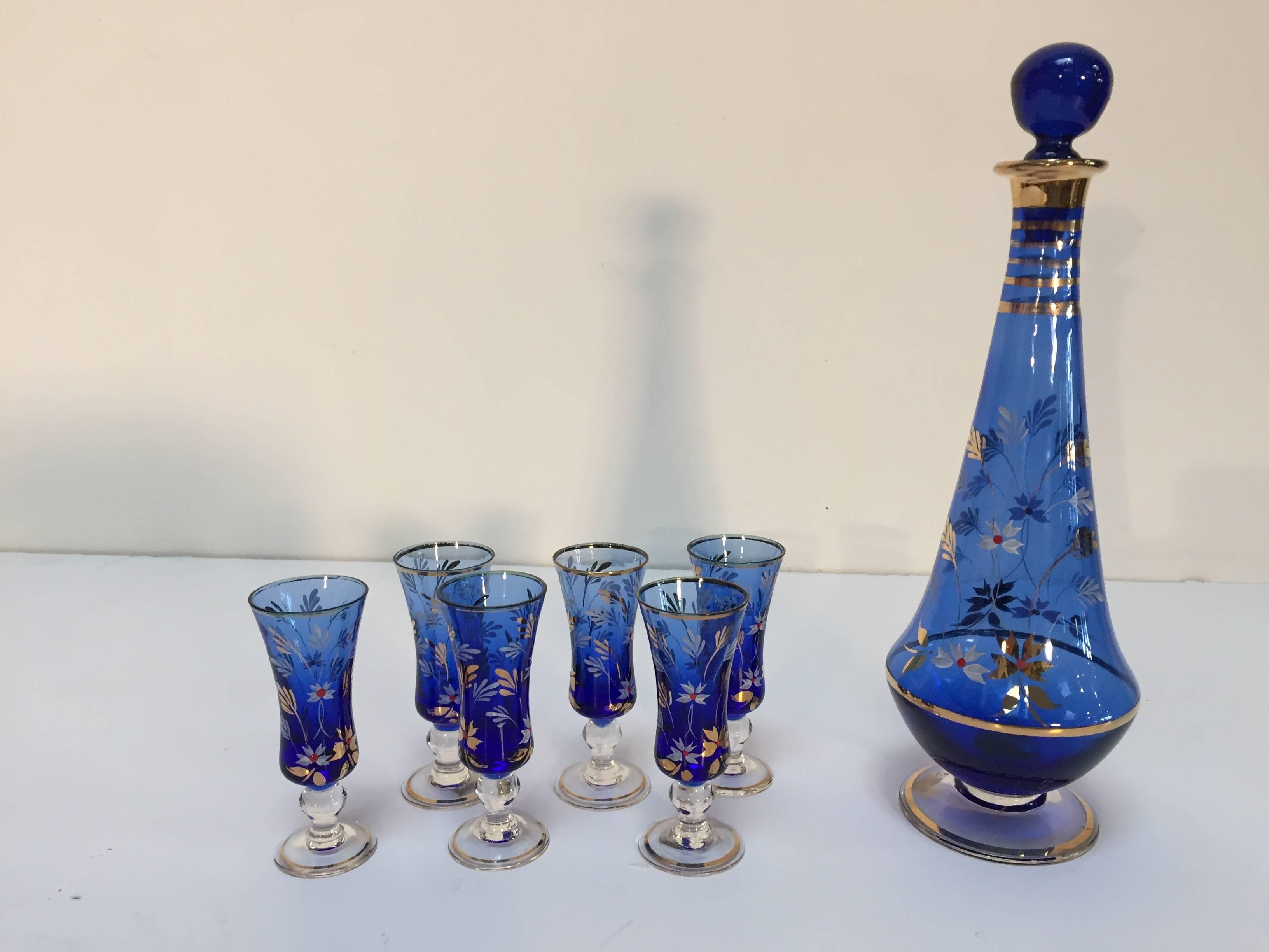 blue decanter with glasses
