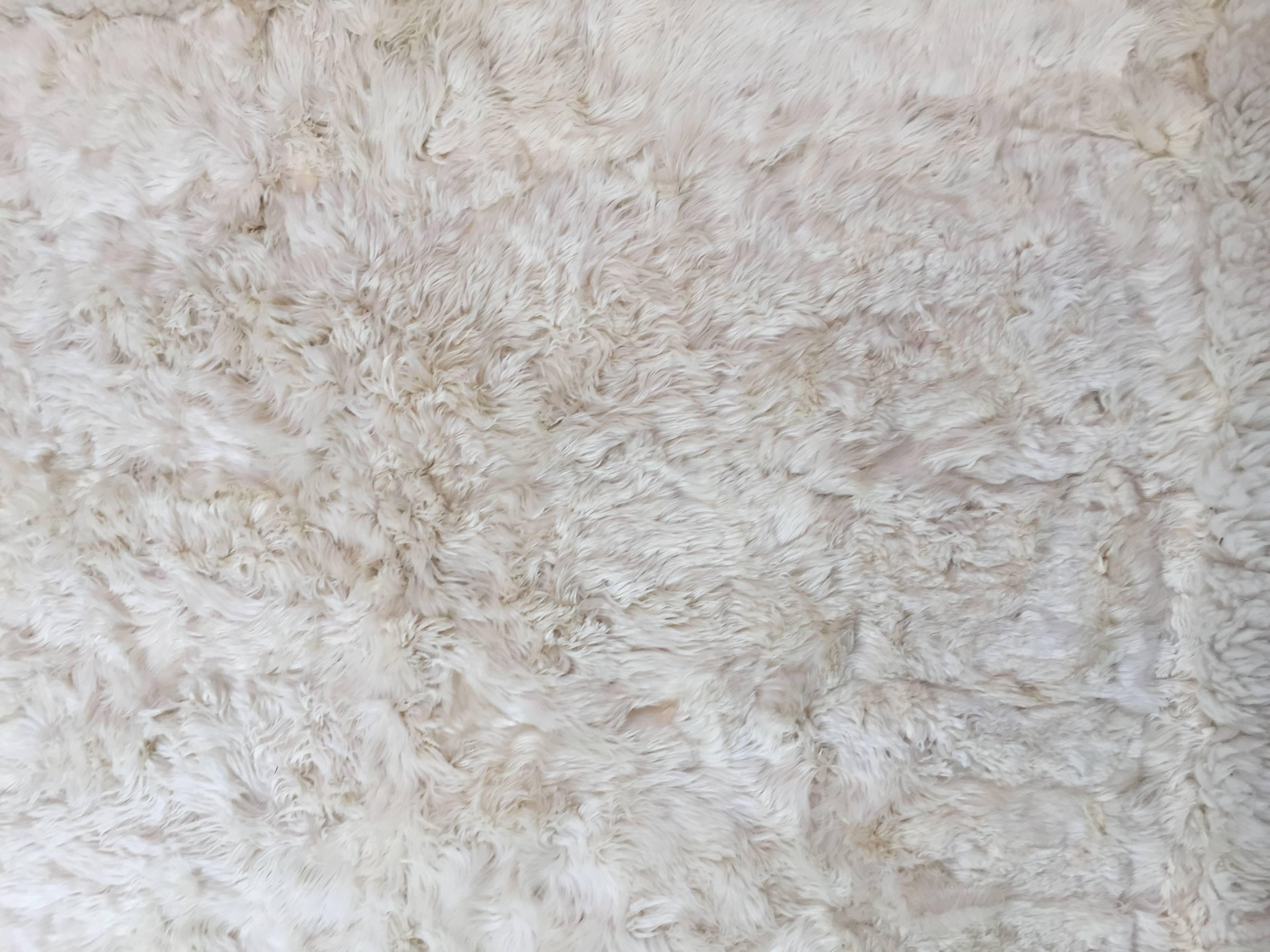Bohemian 1970s White Fluffy Sheep Skin Bed Throw or Rug For Sale