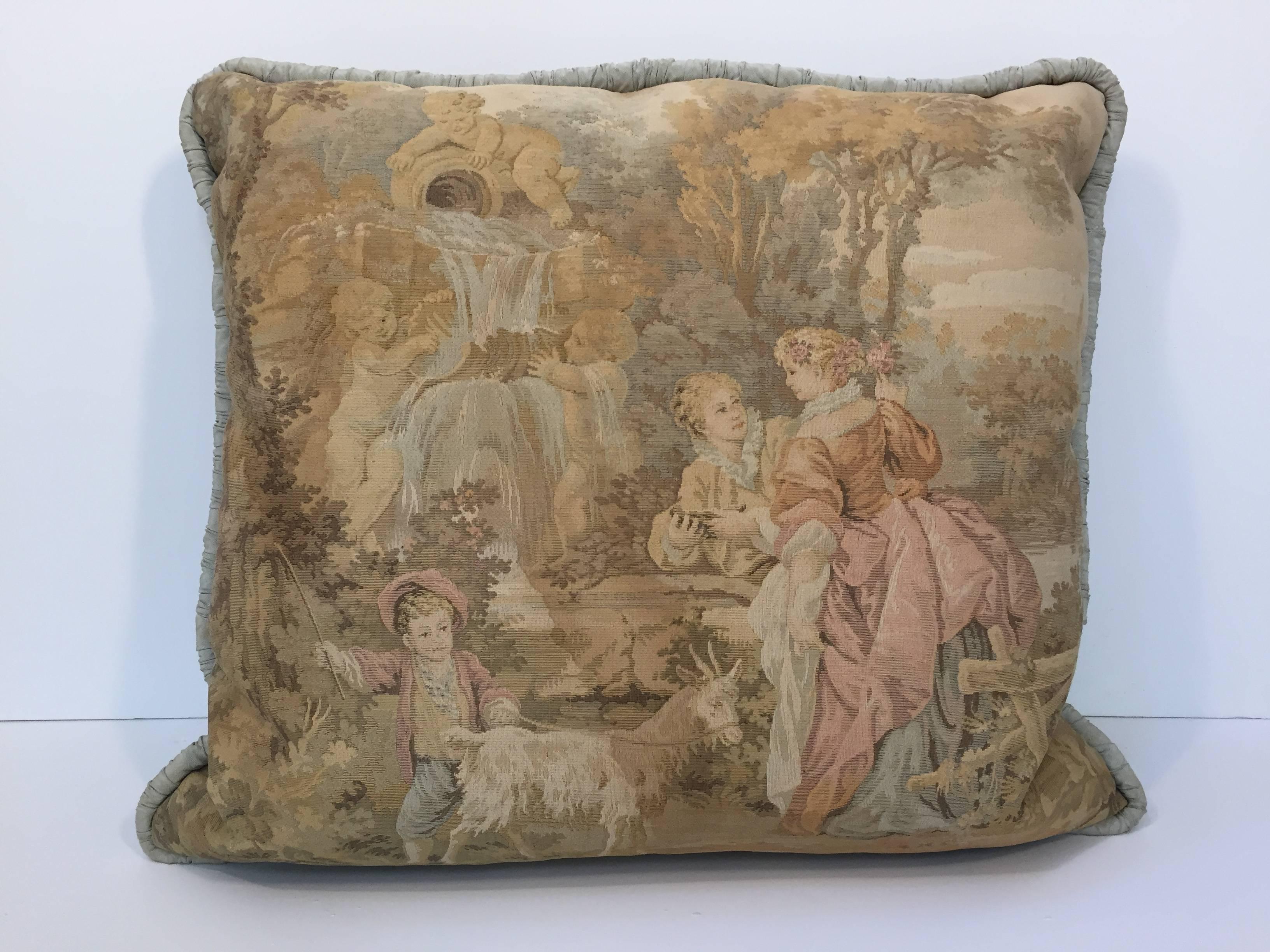 Large decorative pair of French Aubusson style tapestry pillows backed with light blue silk velvet.
Each pillow depict a different rural 19th century scene people and animals enjoying the outdoors.
Custom-made pillow insert hand-stitched (no