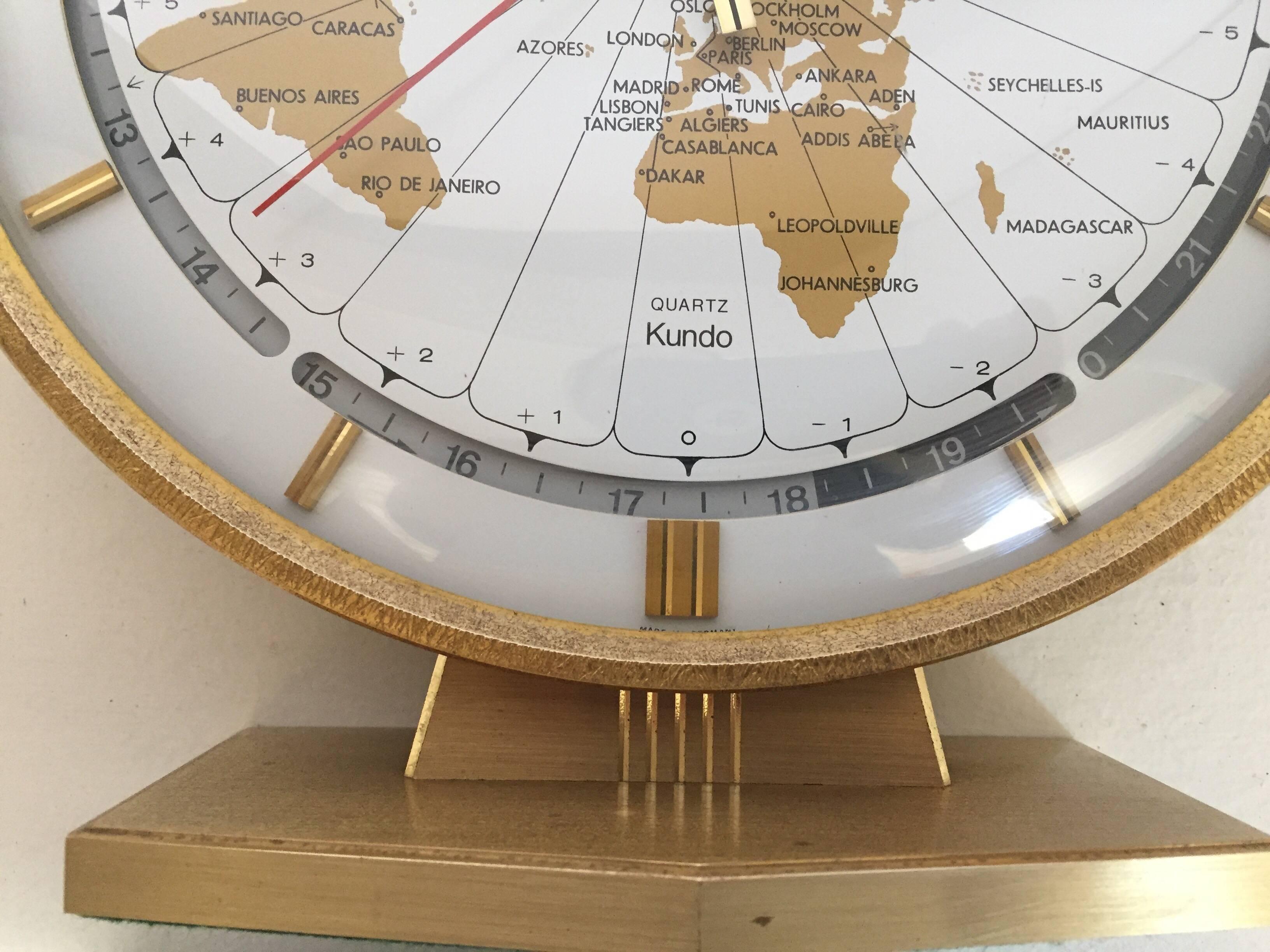Large Kieninger & Obergfell modernist table world timer zone clock, 1960s
Unique brass round world clock by Kundo Automatic made in West Germany, circa 1960s.
Wonderful round clock with large 9