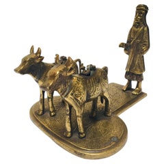 Brass Hindu Temple Oil Lamps Figures a Two Cows and Holly Man Standing