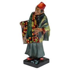 Royal Doulton "Il venditore di tappeti", statuetta decorativa marocchina in porcellana