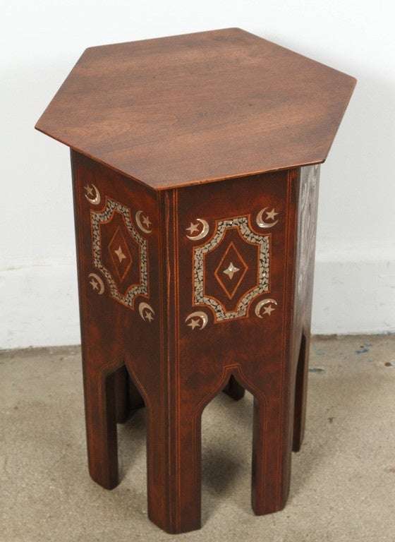 Antique Middle Eastern Turkish side tea table.
Hexagonal shape with each side inlaid with Syrian mother of pearl and moon and stars. Moorish arches on each side. Nice addition for your Moroccan or Spanish room project.